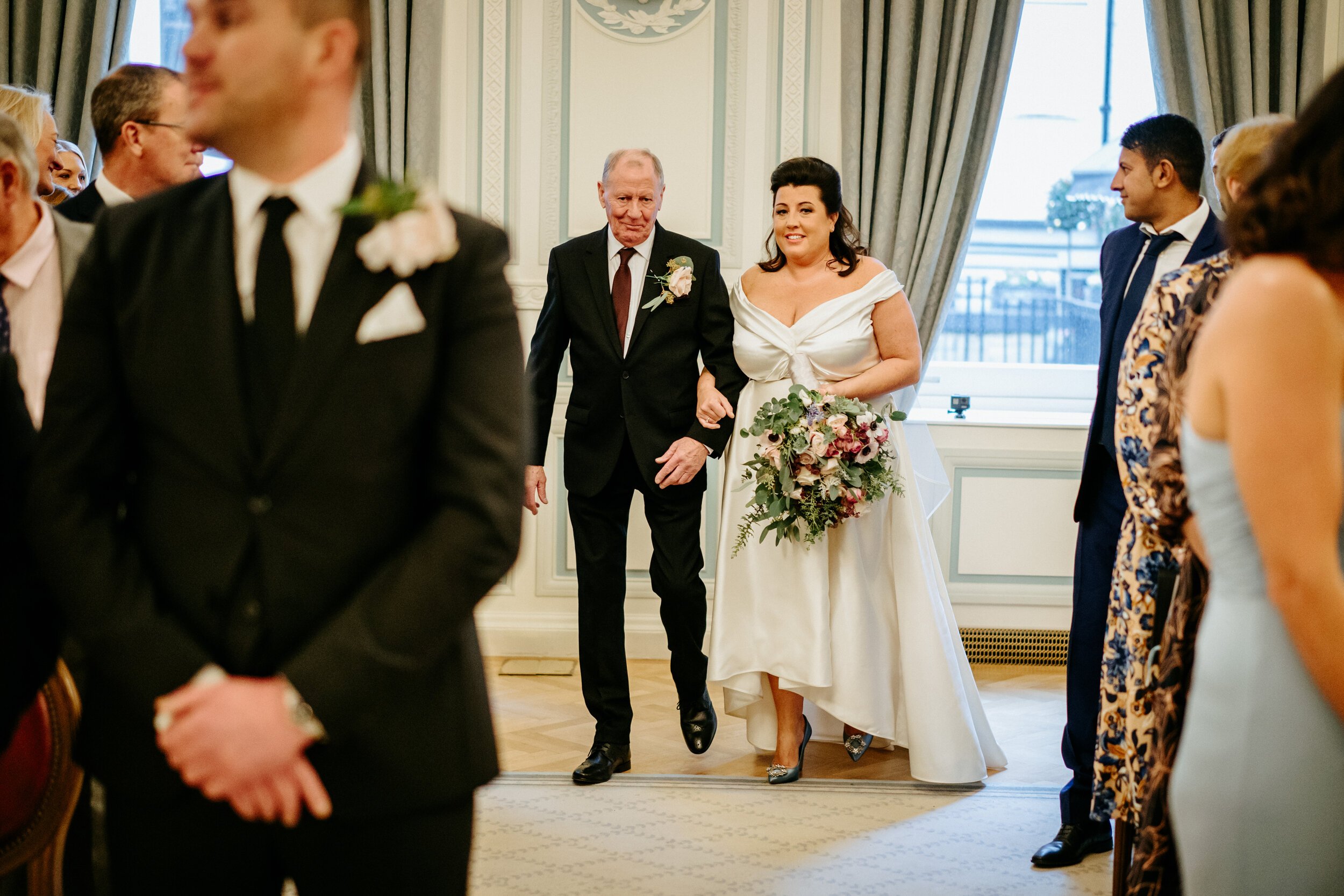 Beautiful bride Louise wore a wedding dress by Halfpenny London