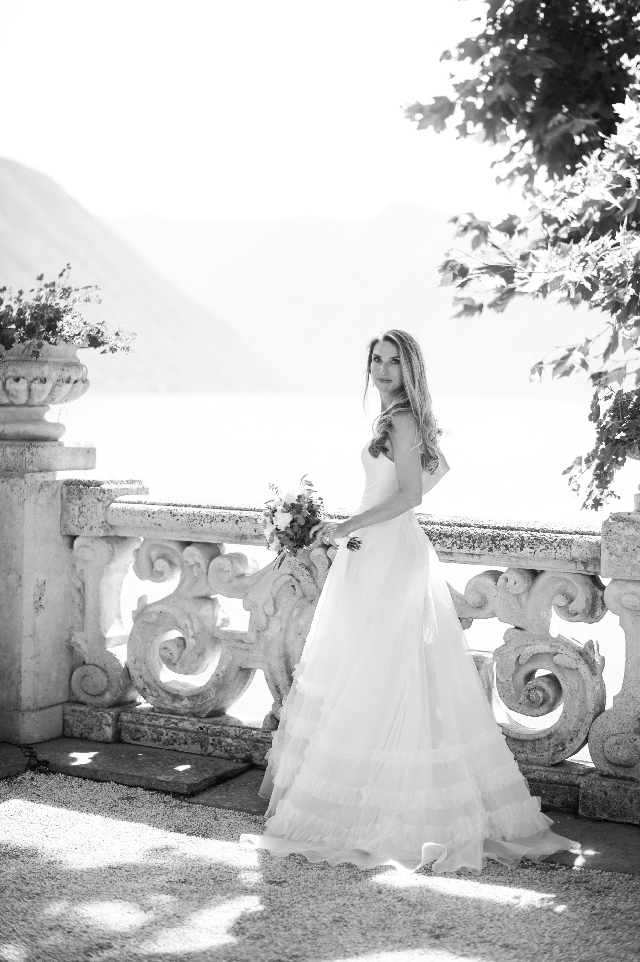 Beautiful bride Alice wore the Oliver wedding dress, sheer organza Mayfair skirt and Issa shrug.