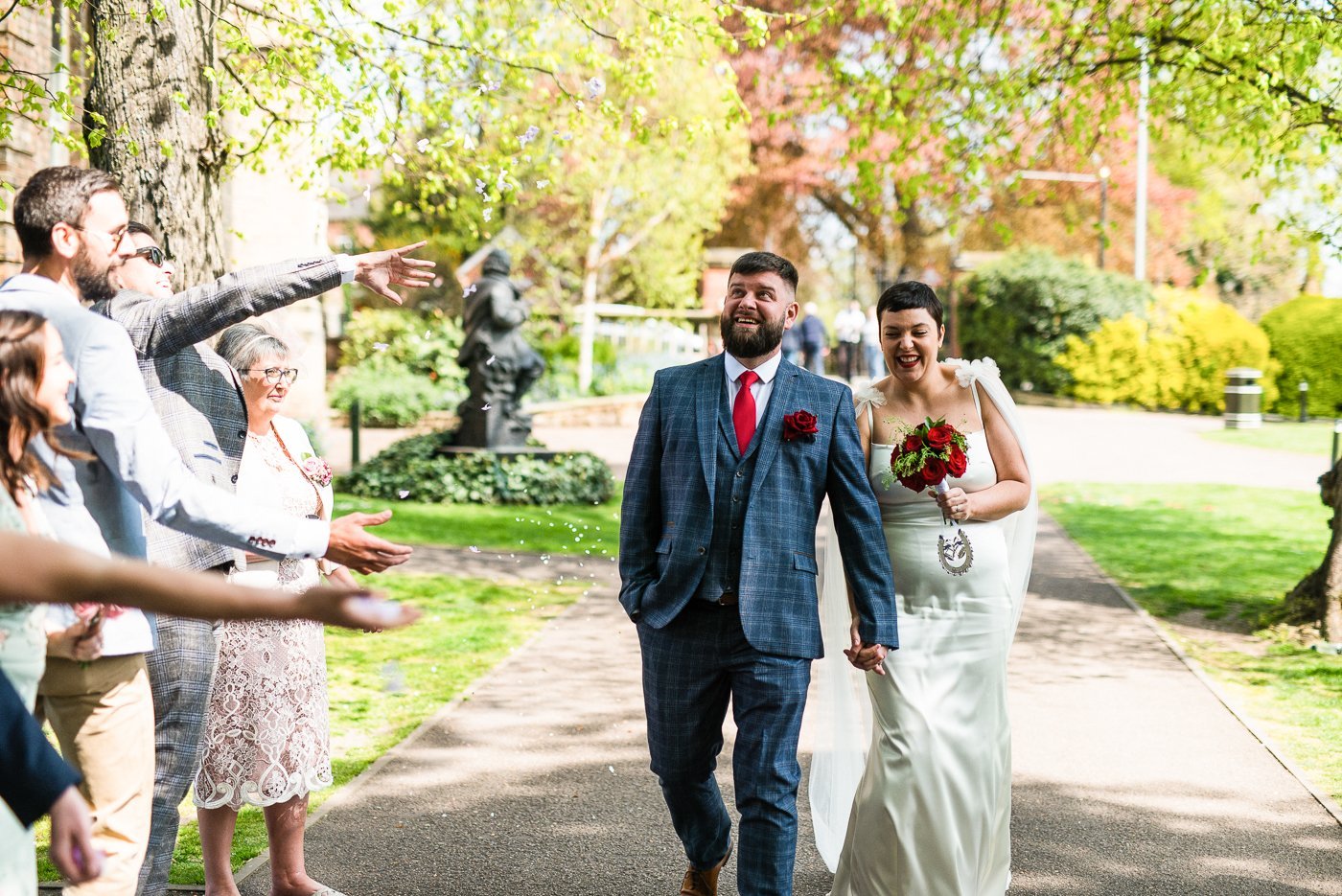 Beautiful bride Emily wore the Dion wedding dress and Campagne cape by Halfpenny London