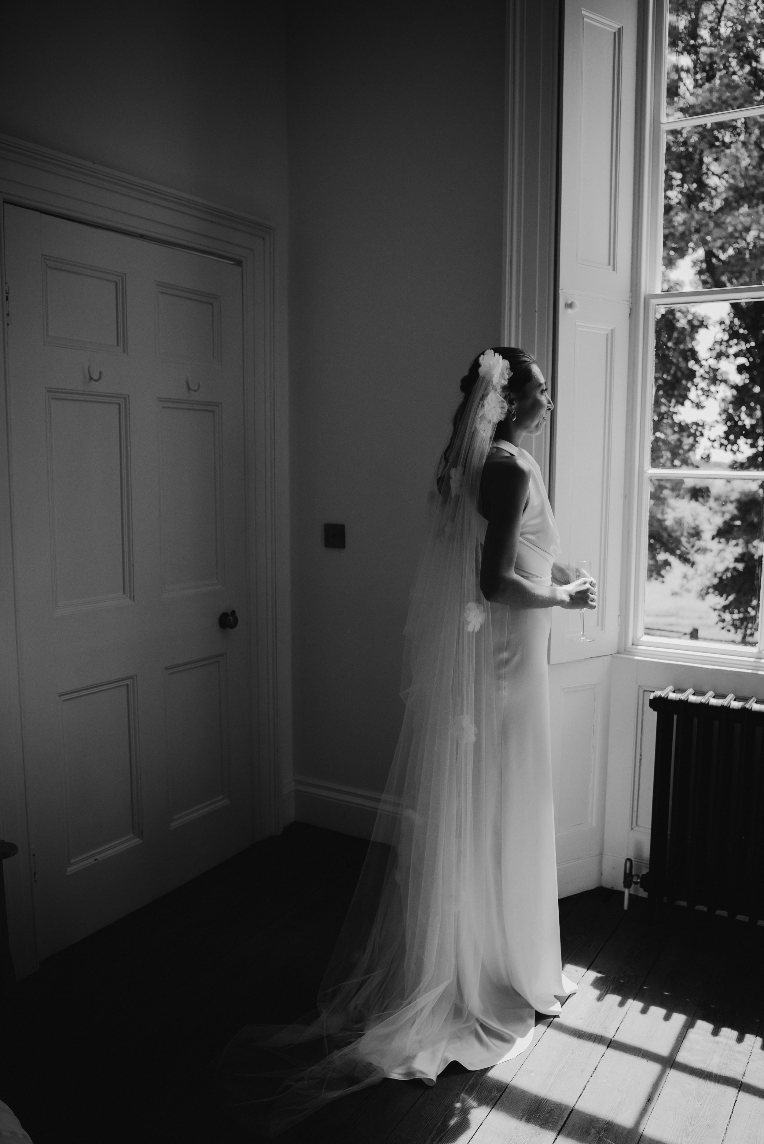 Beautiful bride Mel wore the Cheryl wedding dress and Madeleine veil by Halfpenny London