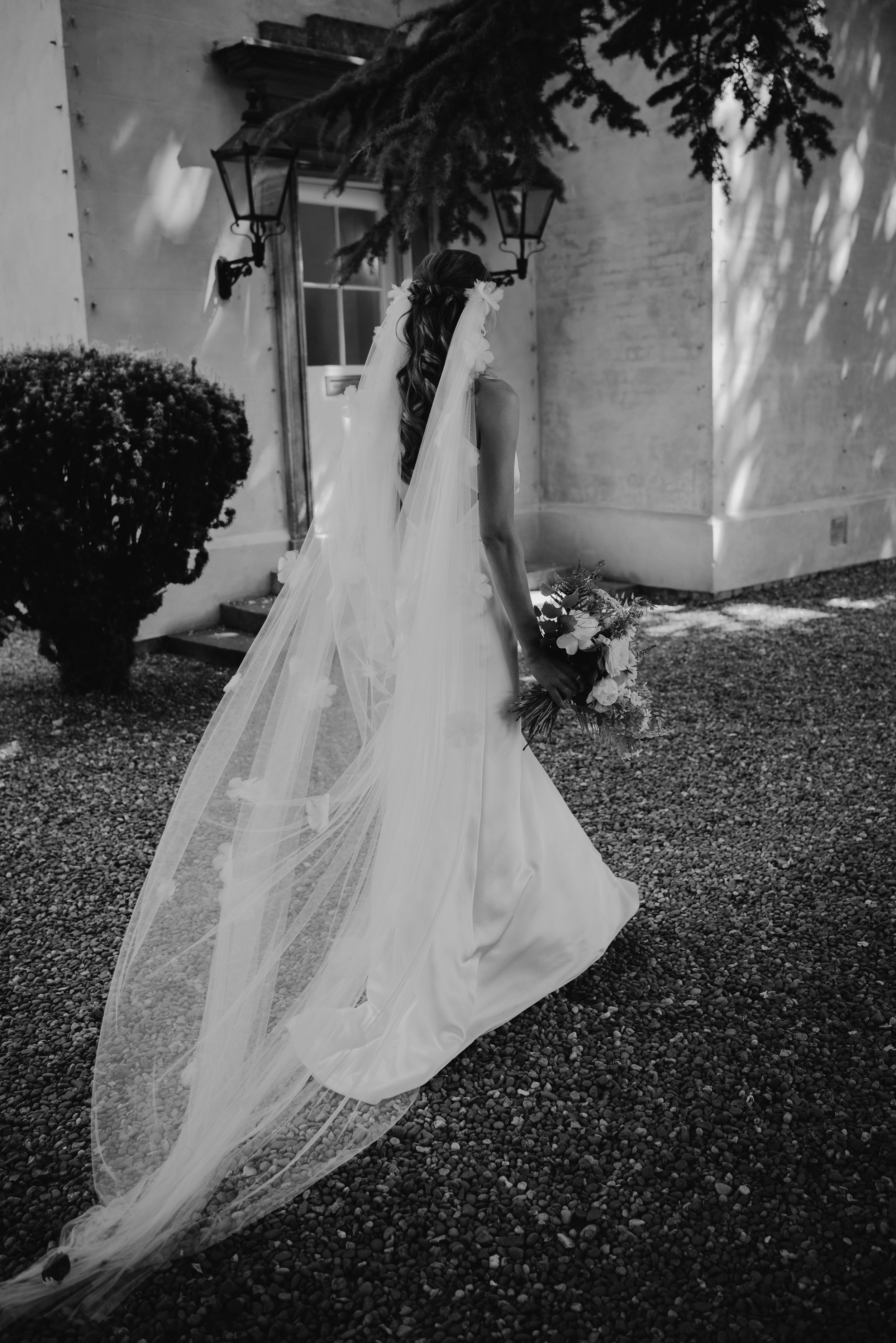 Beautiful bride Mel wore the Cheryl wedding dress and Madeleine veil by Halfpenny London