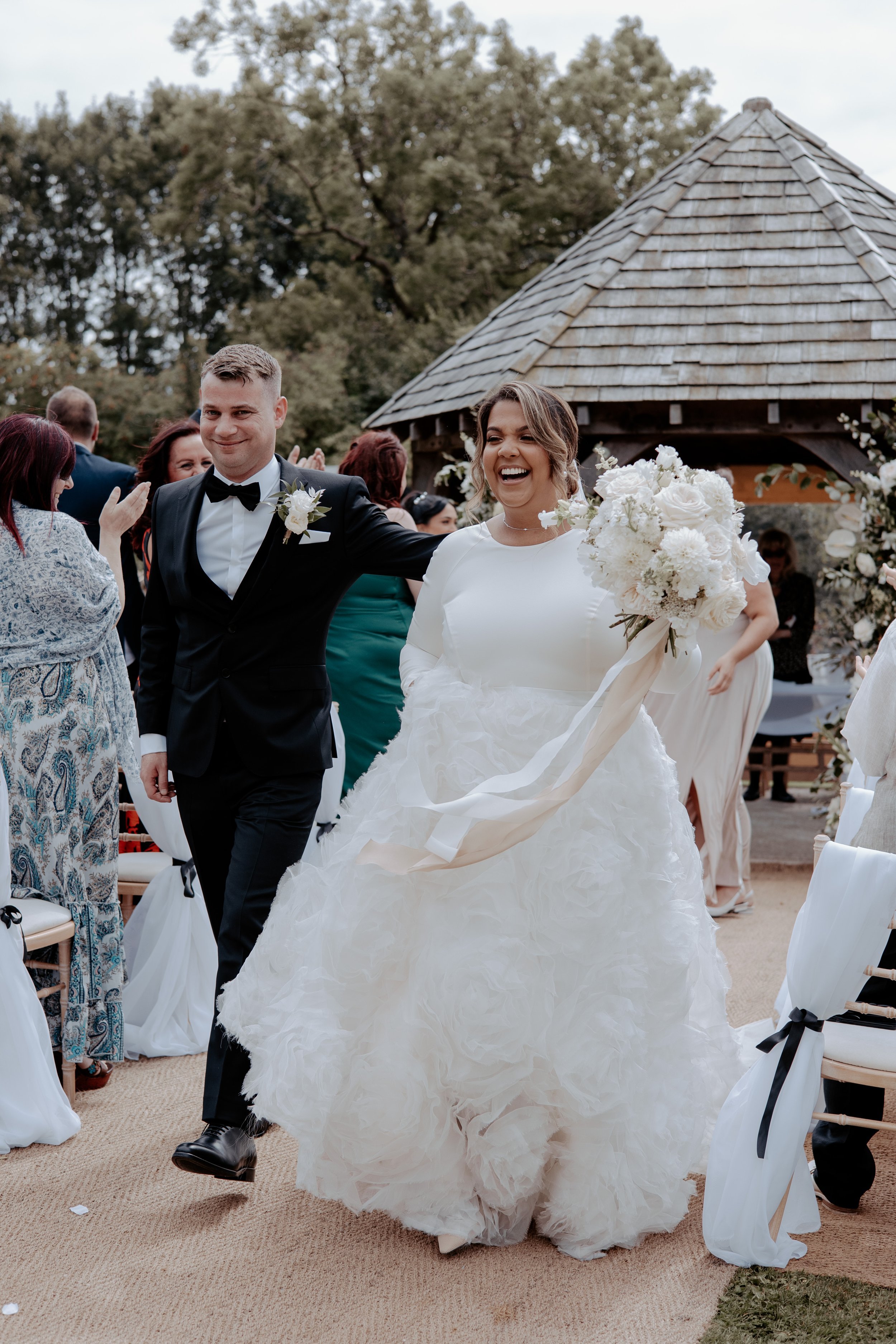 Beautiful bride Natalie wore the Ruffle Rose skirt and a bespoke Gordon top | Wedding dress by Halfpenny London