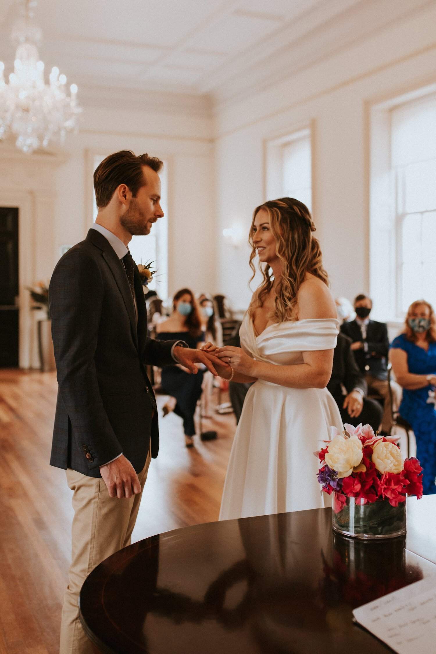 Beautiful bride Gina wore an off the shoulder top and High-Low skirt - bridal separates by Halfpenny London - with white ankle boots on her wedding day