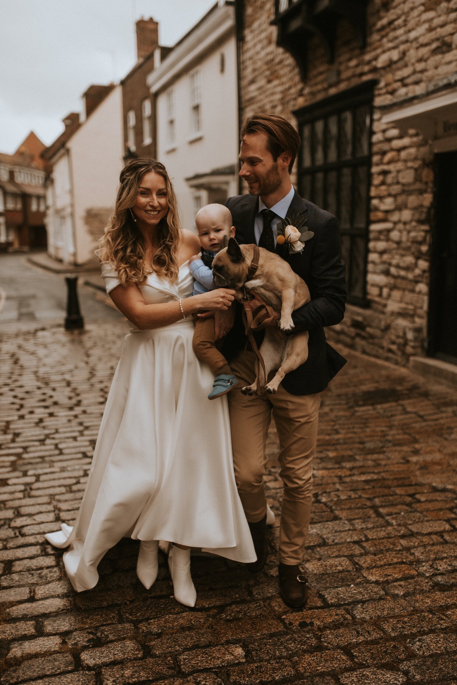 Beautiful bride Gina wore an off the shoulder top and High-Low skirt - bridal separates by Halfpenny London - with white ankle boots on her wedding day