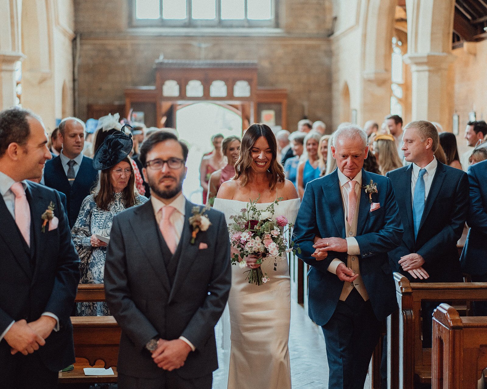 Beautiful bride Emma wore a wedding dress by Halfpenny London