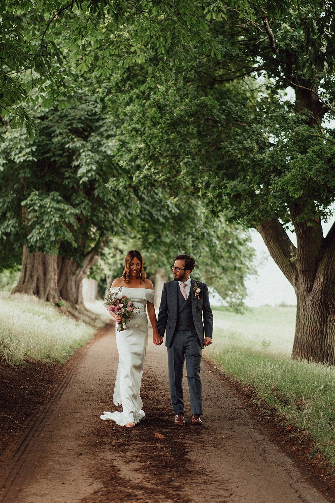 Beautiful bride Emma wore a wedding dress by Halfpenny London