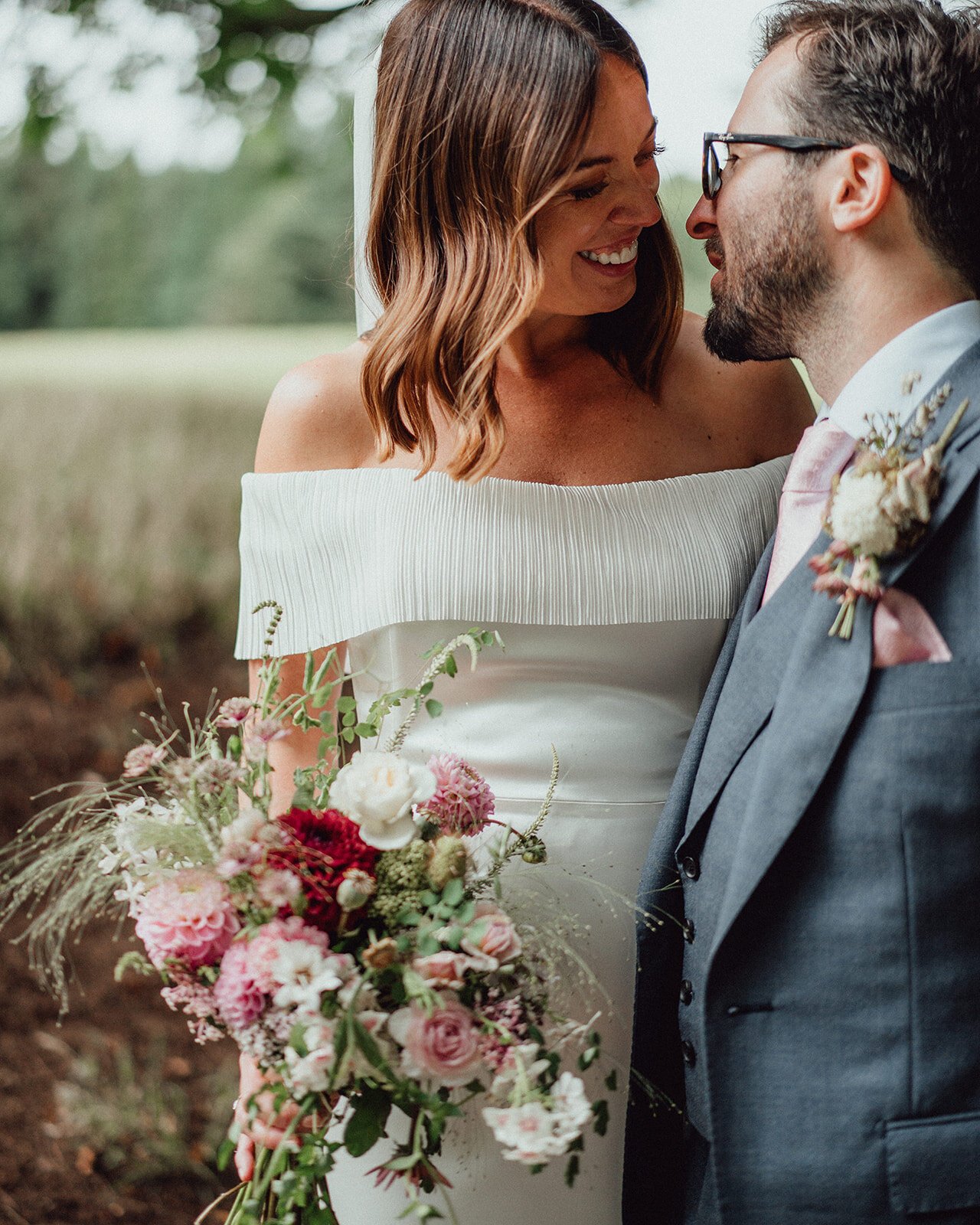 Beautiful bride Emma wore a wedding dress by Halfpenny London