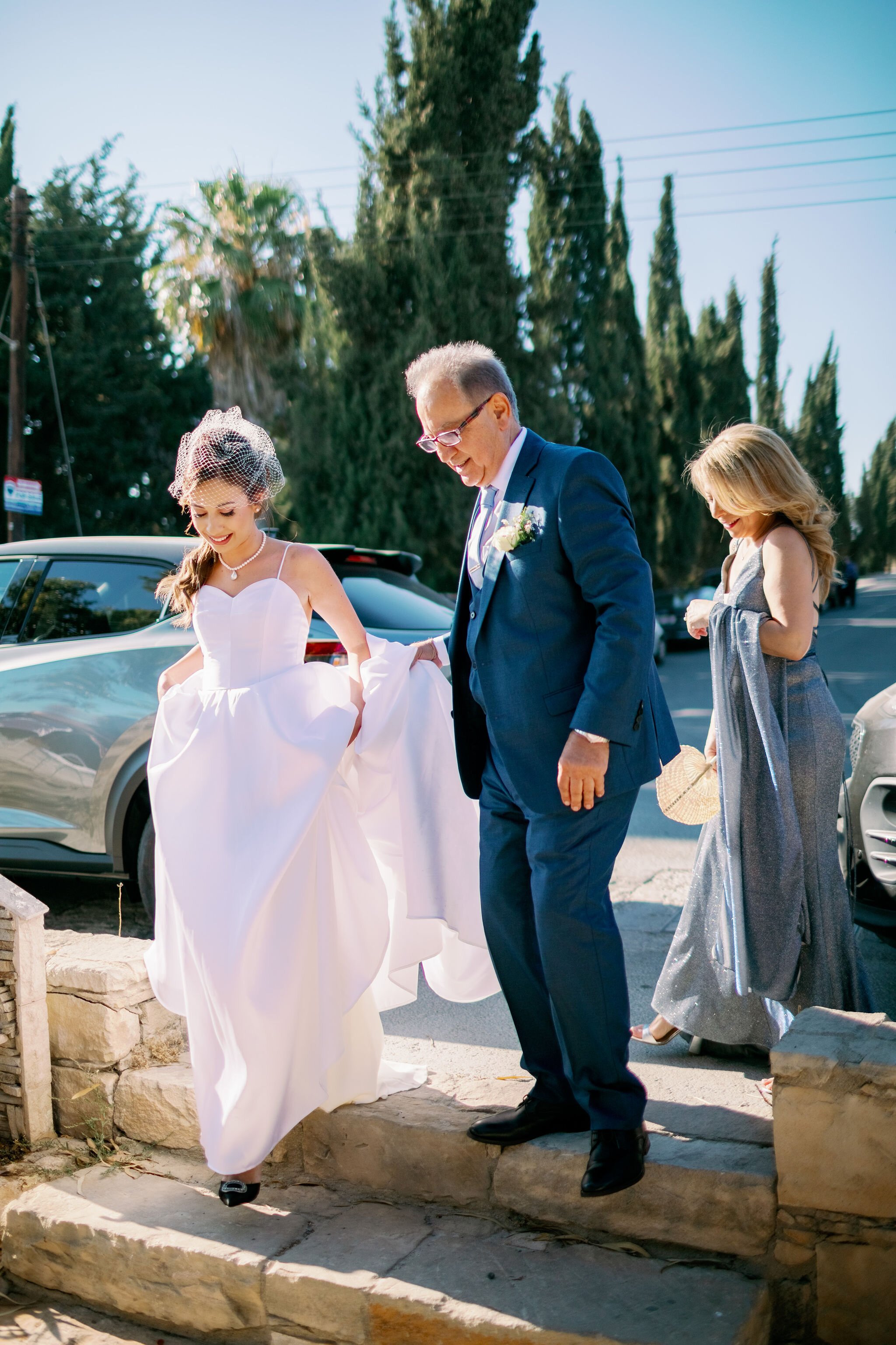 Beautiful bride Alexia wears the Ellie dress and Daniel top from Halfpenny London
