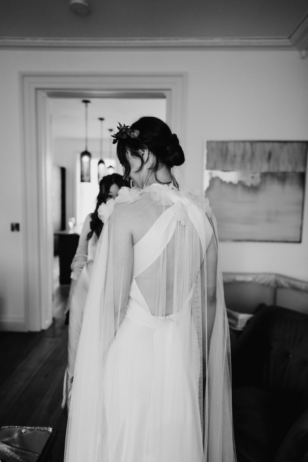 Beautiful bride Rach wore the Cheryl wedding dress and Campagne cape by Halfpenny London