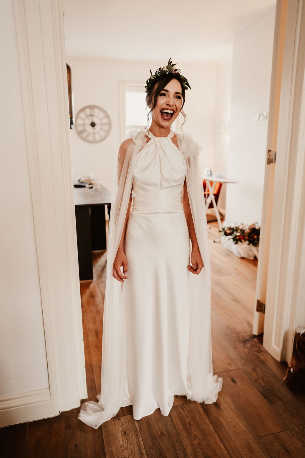 Beautiful bride Rach wore the Cheryl wedding dress and Campagne cape by Halfpenny London