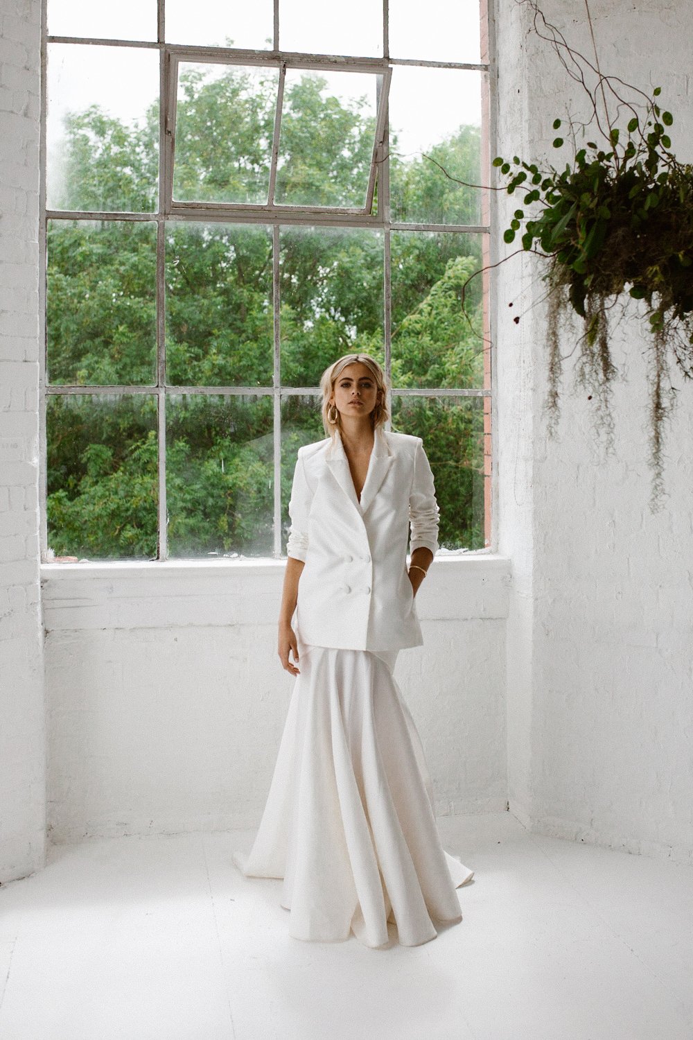 Minimalist bridal style inspiration shoot featuring wedding dresses and bridal wear by Halfpenny London