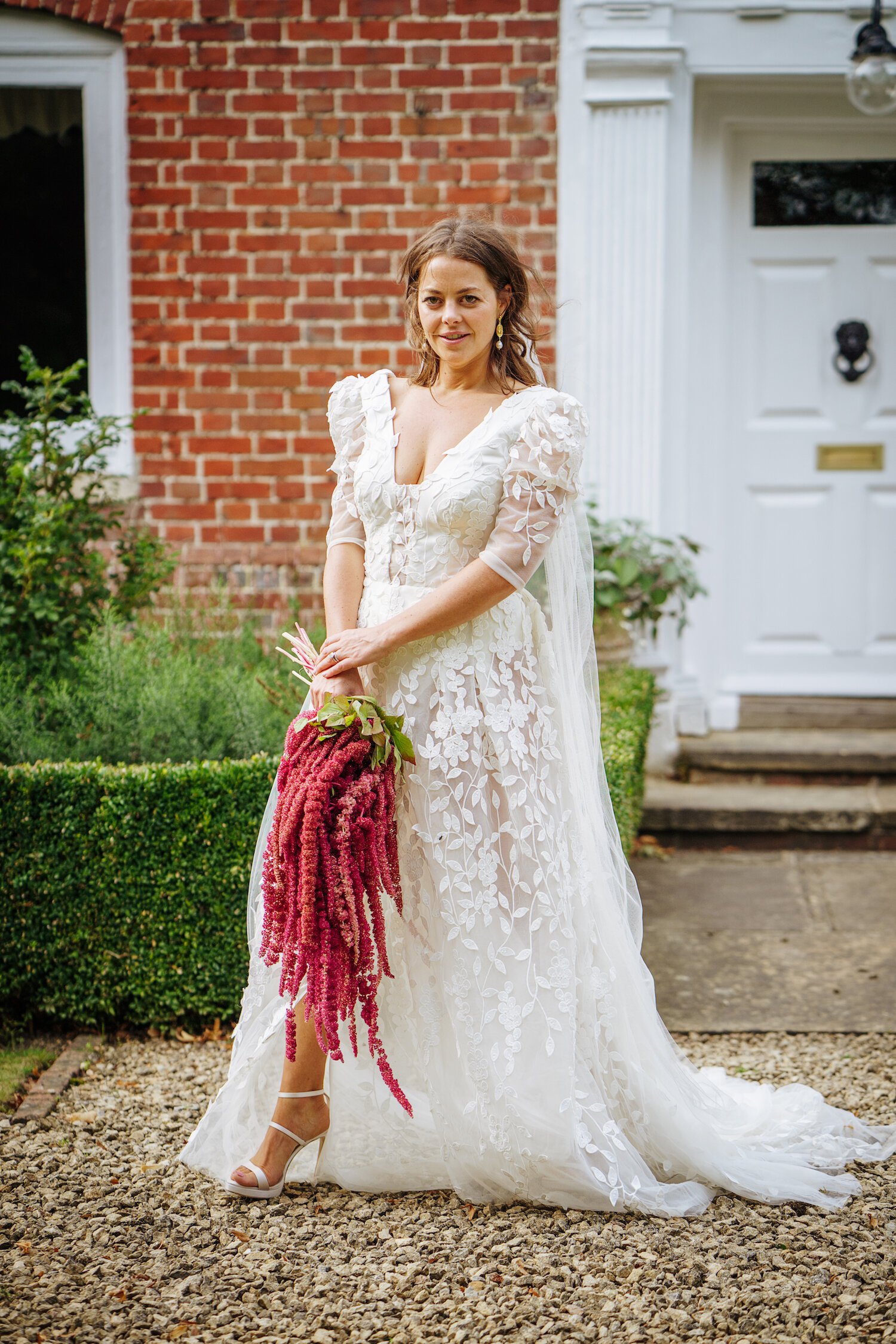 Beautiful bride Georgie wears a bespoke dress by Halfpenny London