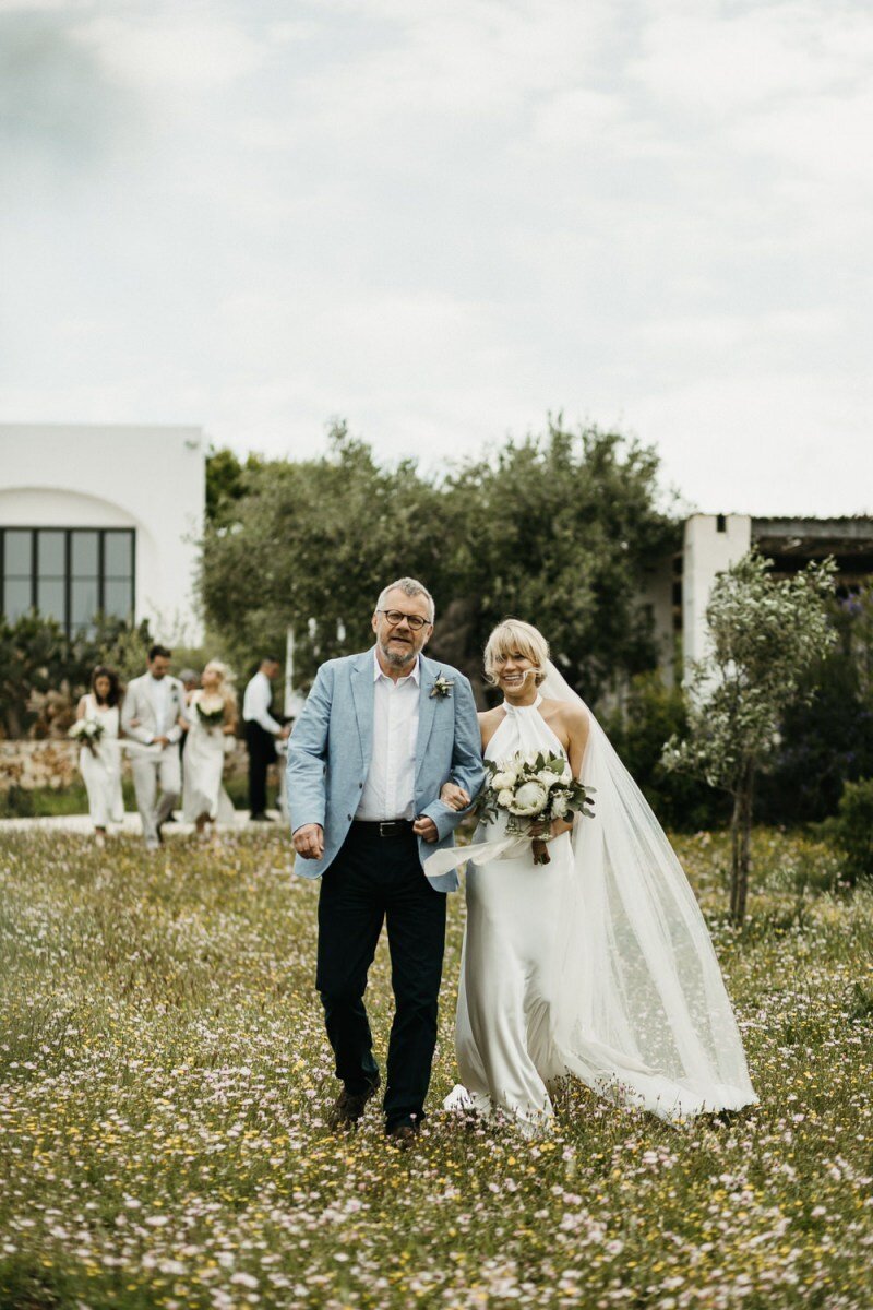 Beautiful bride Morag wears the Cheryl dress by British bridal designer Halfpenny London