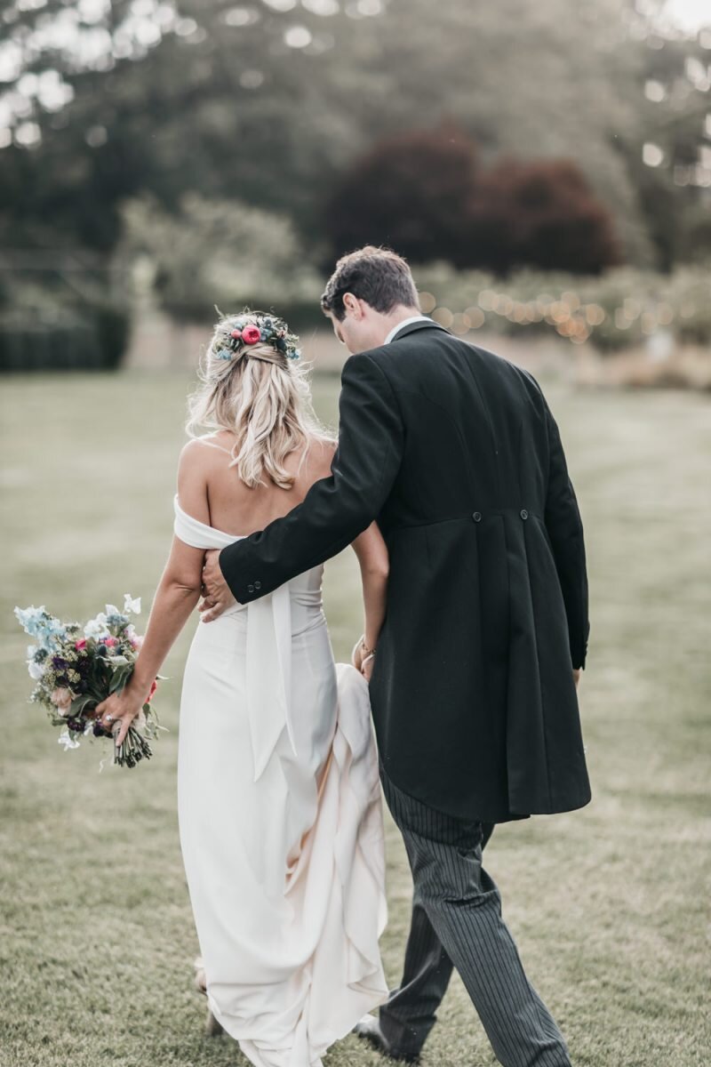 Beautiful bride Lottie wears the Charlotte dress by Halfpenny London