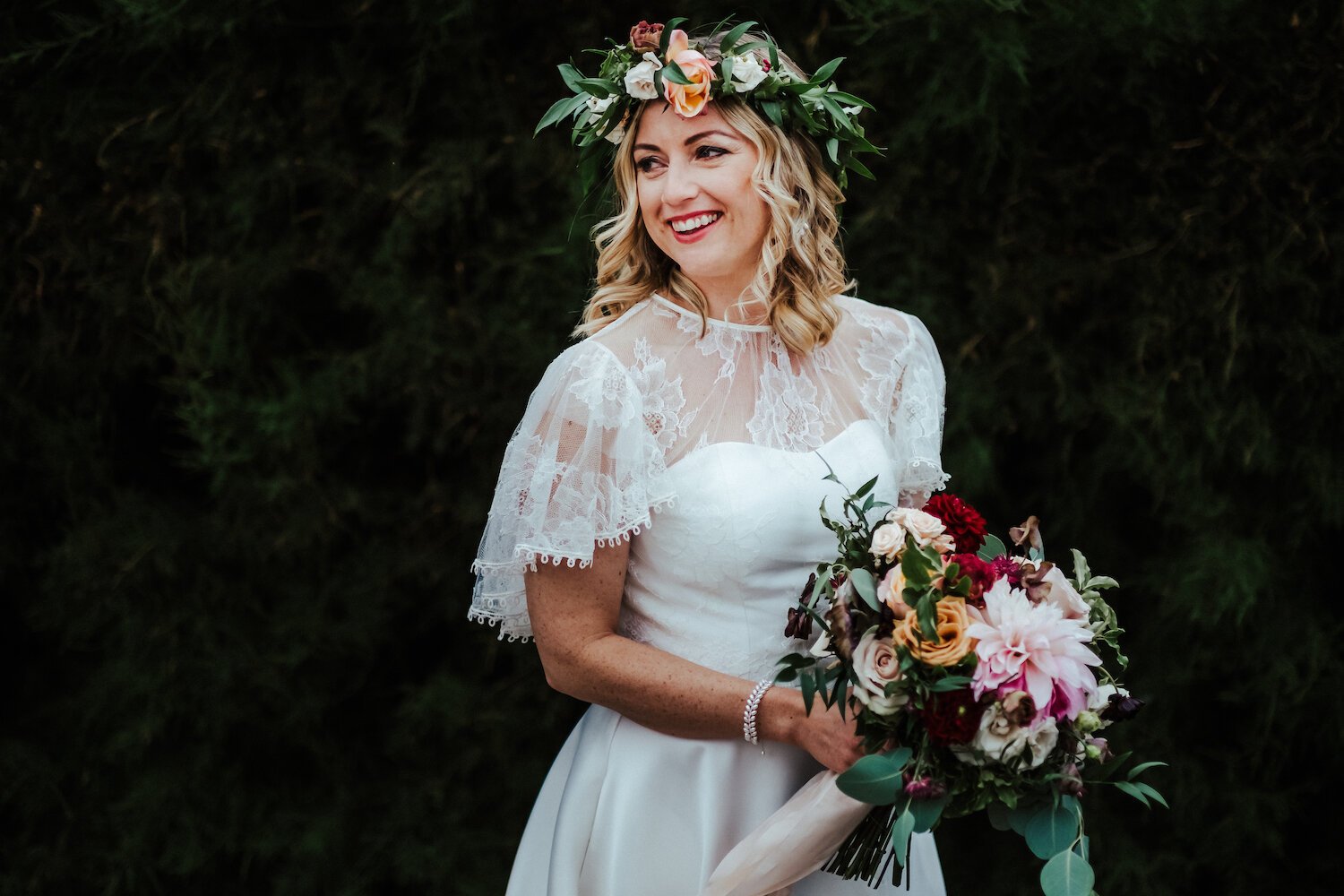 Beautiful bride Laura wears the high-low Breeze dress and Ridley top by Halfpenny London 