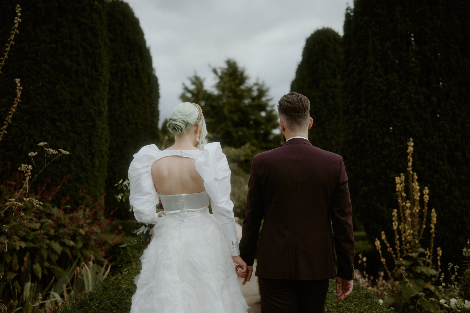Beautiful bride Claire wore the Ruffle Rose Skirt, Mars Sleeves and a bespoke corset by Halfpenny London for her wedding day