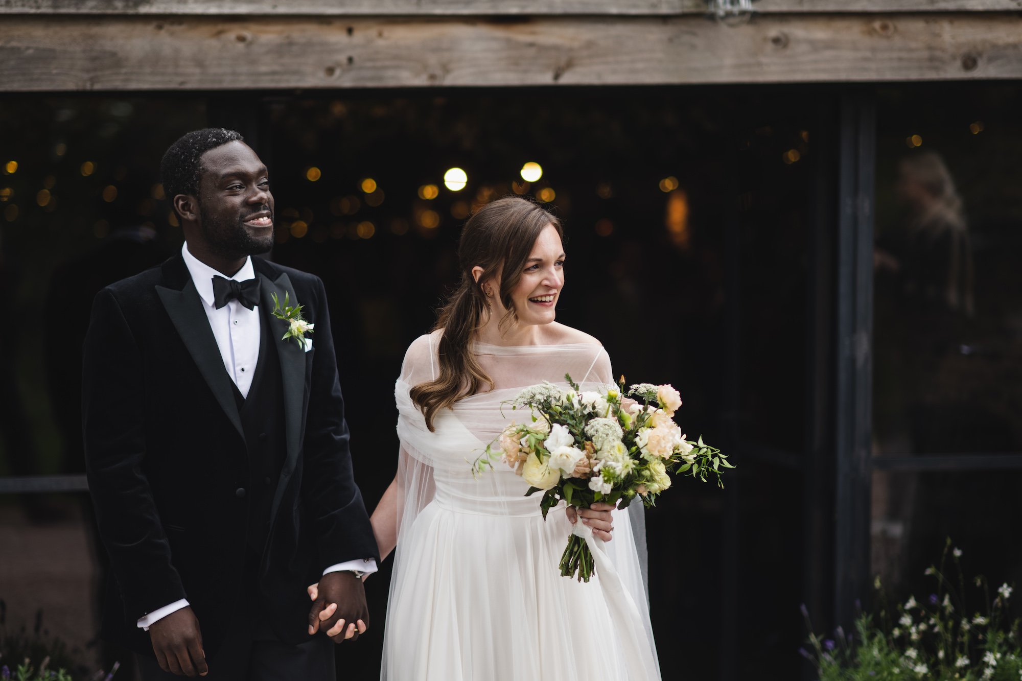 Beautiful bride Emma wore a wedding dress and cape by Halfpenny London