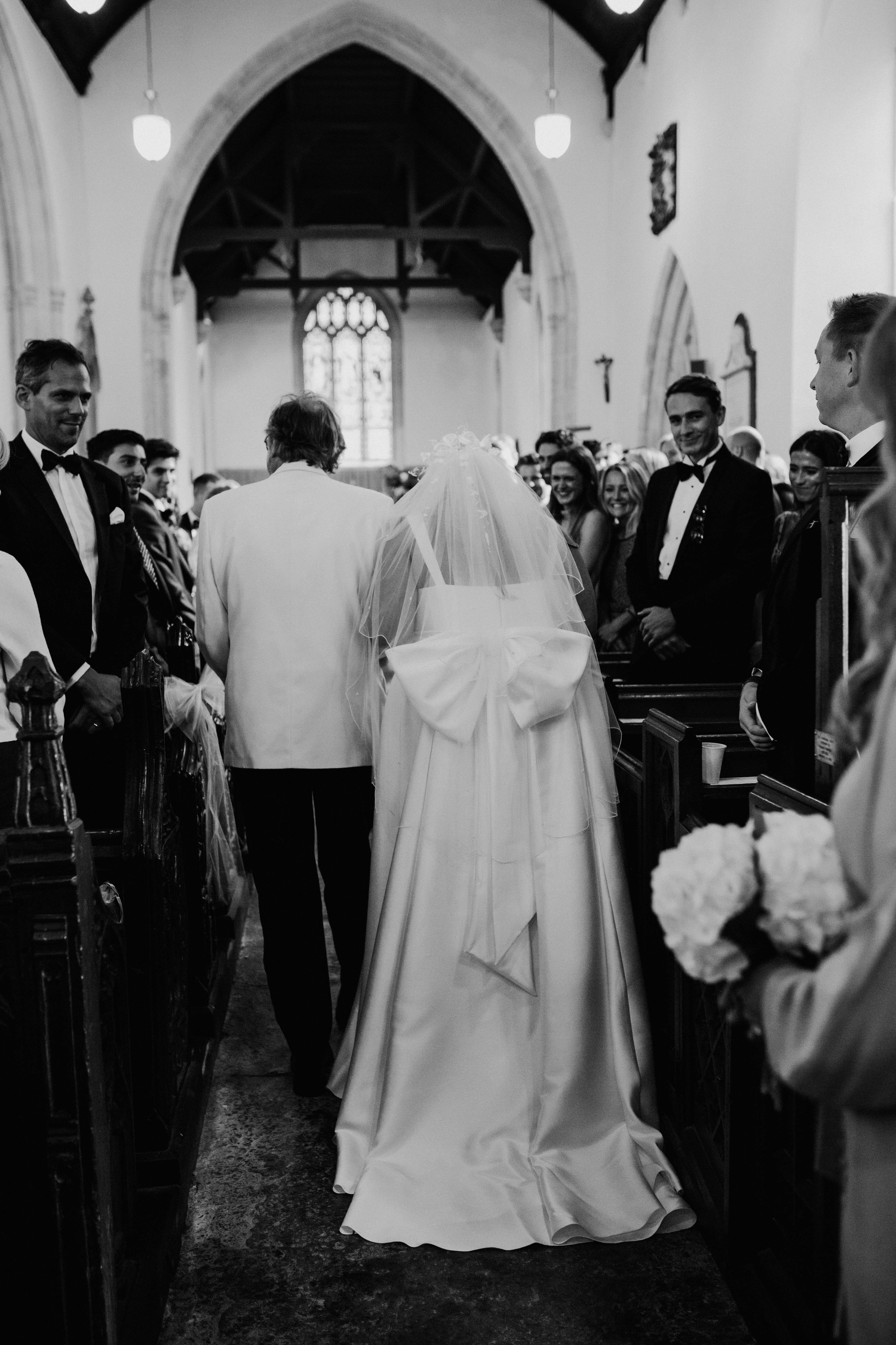 Beautiful bride Elleri wore the Dahlia wedding dress and bow by Halfpenny London