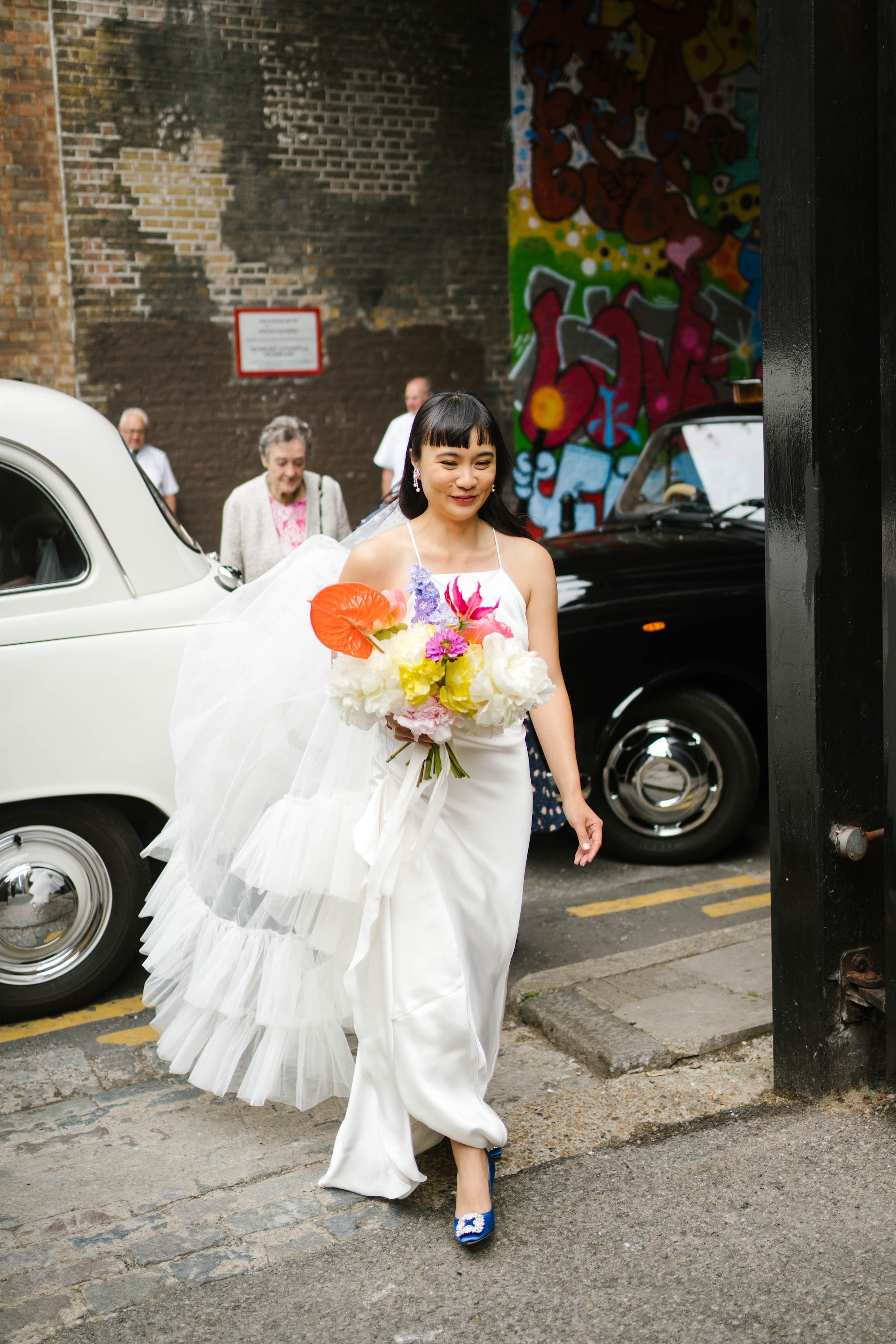 Beautiful bride Angela wore the Max wedding dress and Margaret veil by Halfpenny London