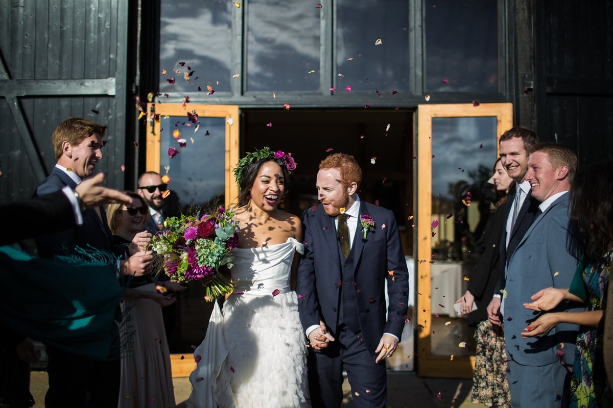 Beautiful bride Leah wore a wedding dress by Halfpenny London