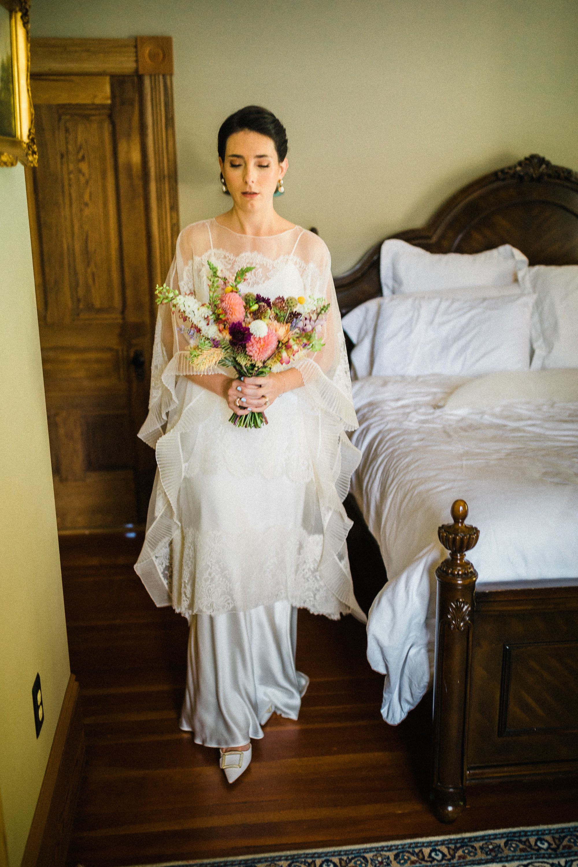 Beautiful bride Cate wore the Cliff tiered lace wedding dress by Halfpenny London