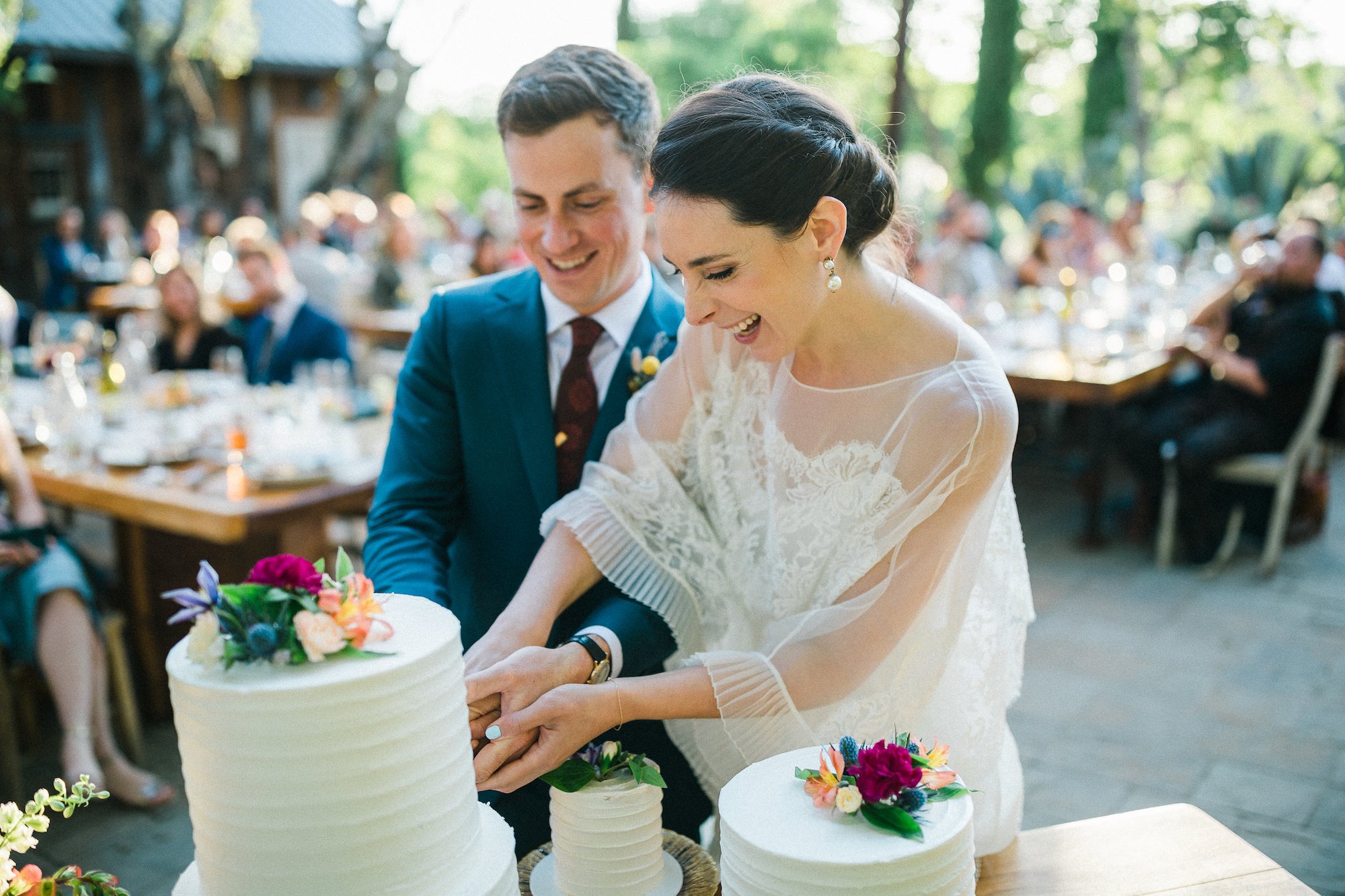 Beautiful bride Cate wore the Cliff tiered lace wedding dress by Halfpenny London