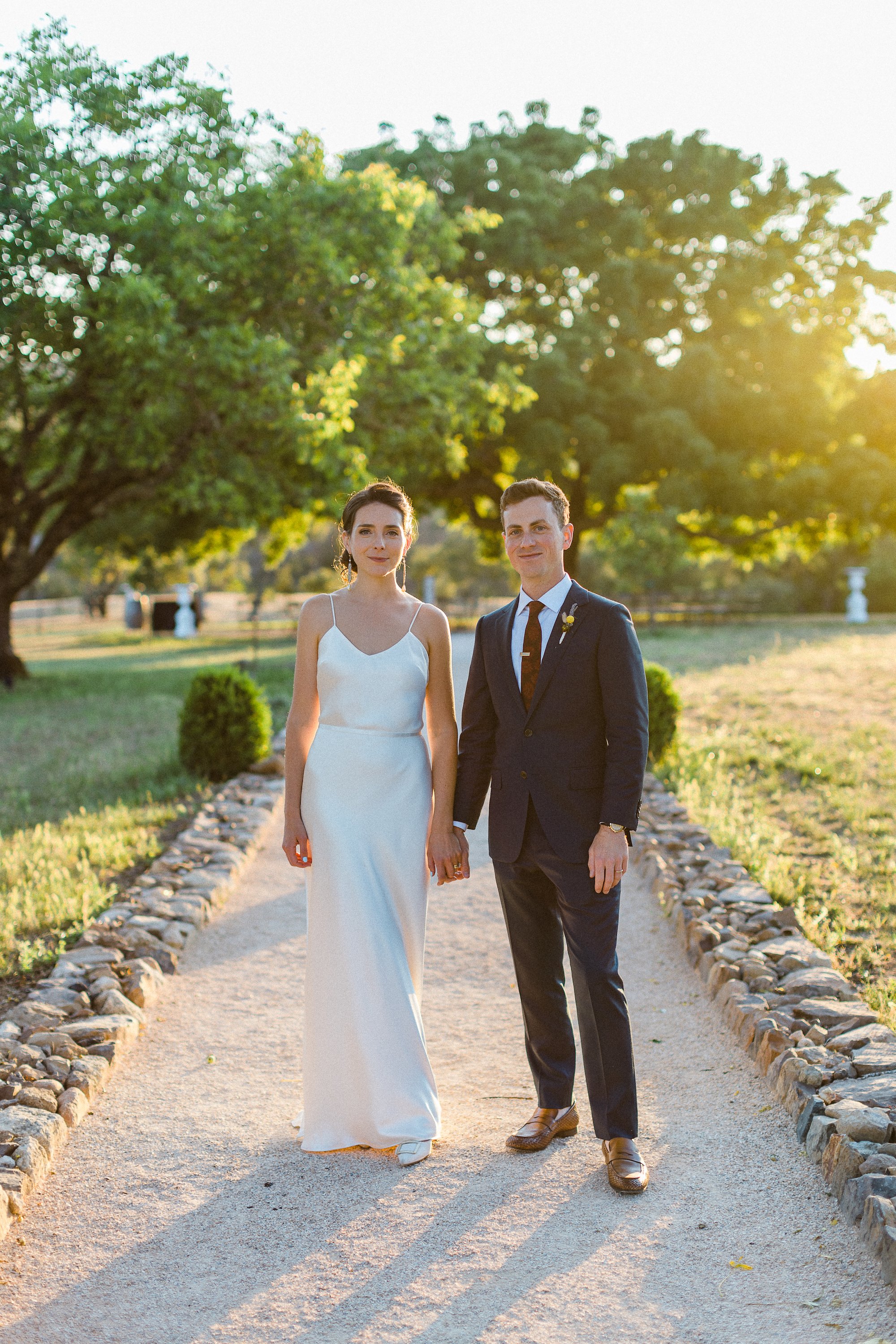 Beautiful bride Cate wore the Cliff tiered lace wedding dress by Halfpenny London