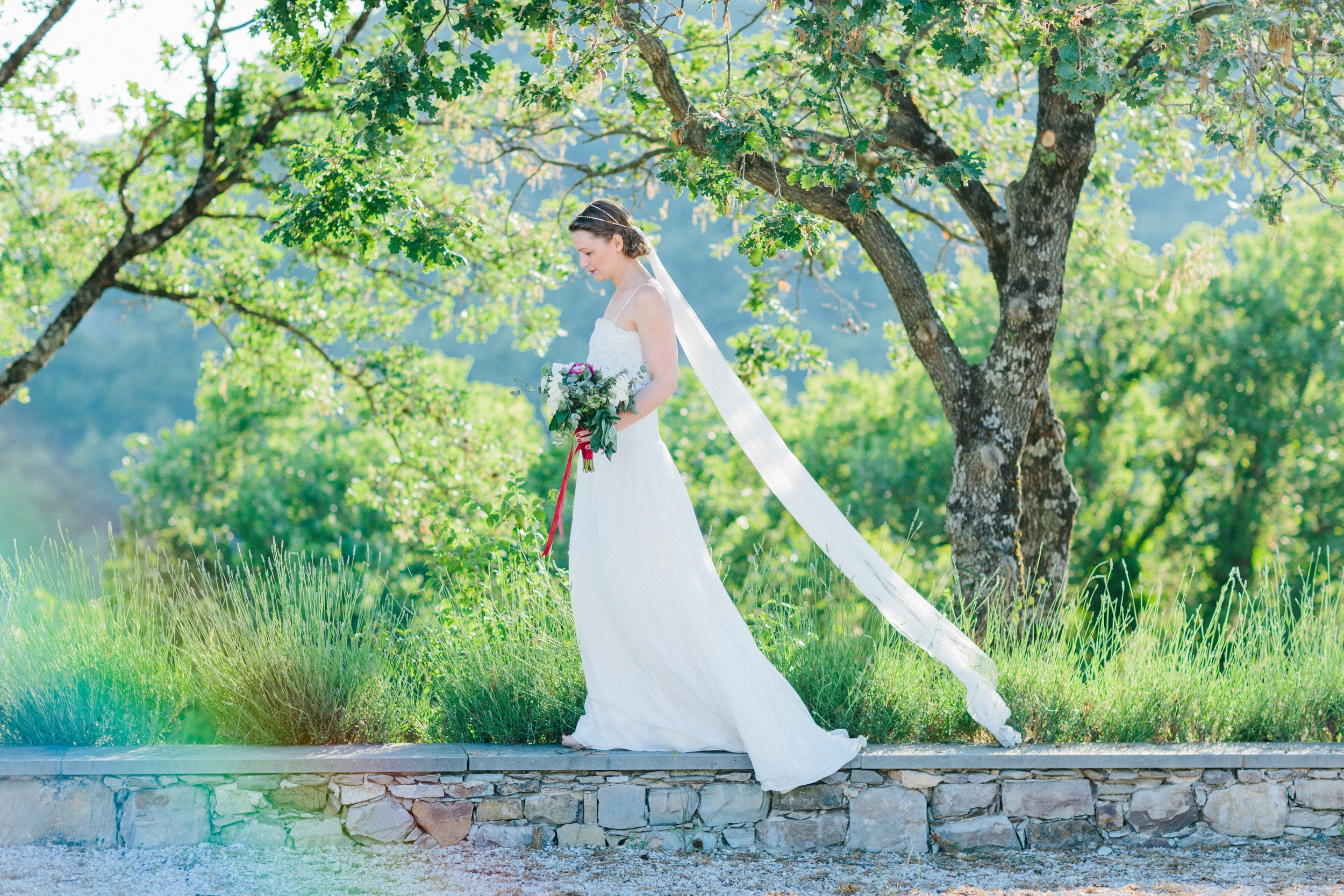 Beautiful bride Christina wears British bridal designer Halfpenny London for her wedding