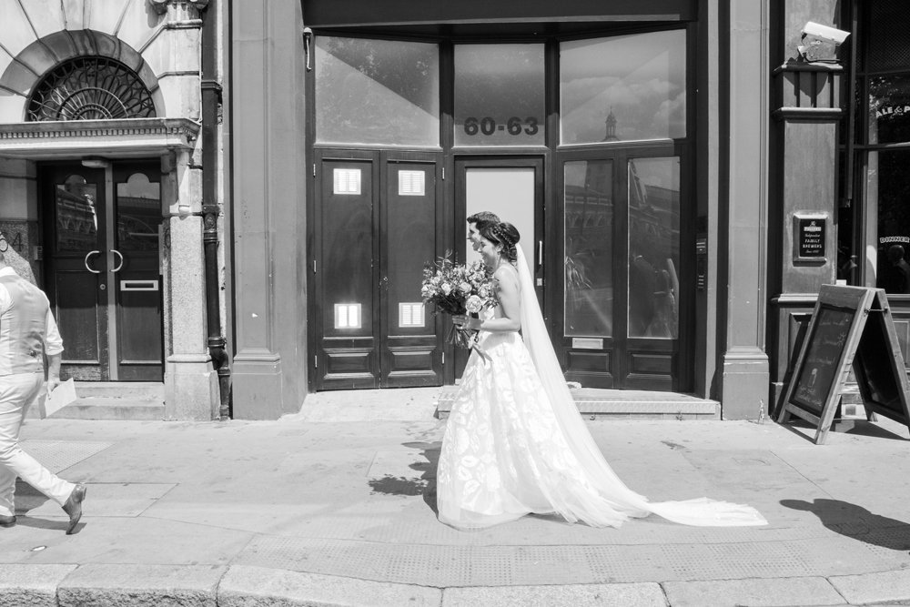 Beautiful bride Clare wears the Susie appliquéd tulle skirt and Iris slip by Halfpenny London