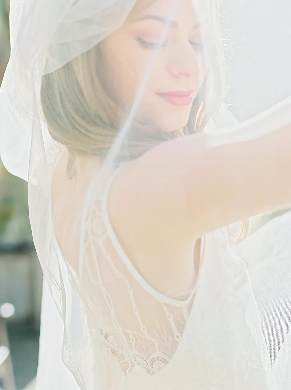 Beautiful bride wears British bridal designer Halfpenny London