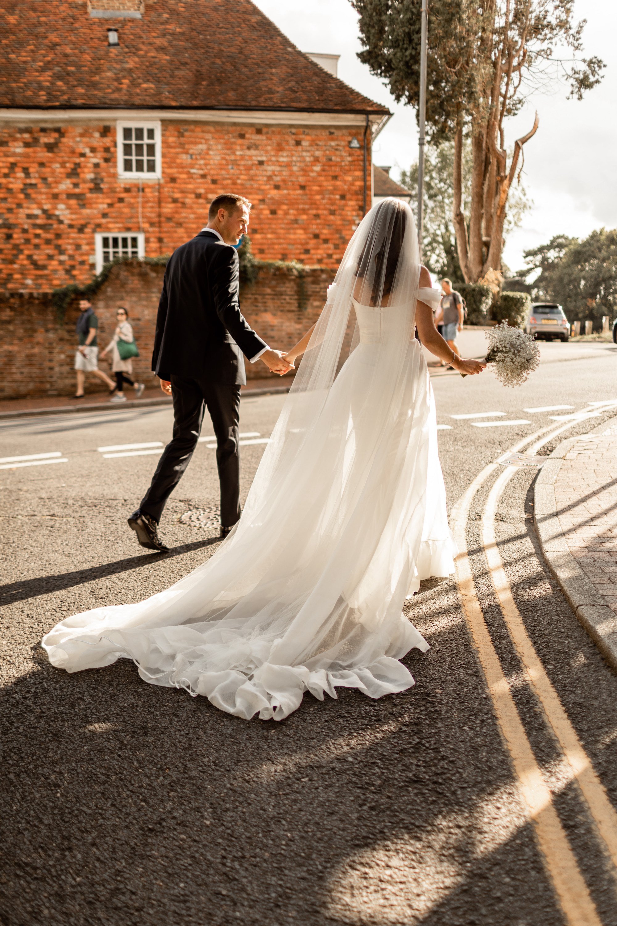 Beautiful bride Sophie wears the Dion dress with bespoke sleeves and the Moon skirt | Wedding dress by Halfpenny London