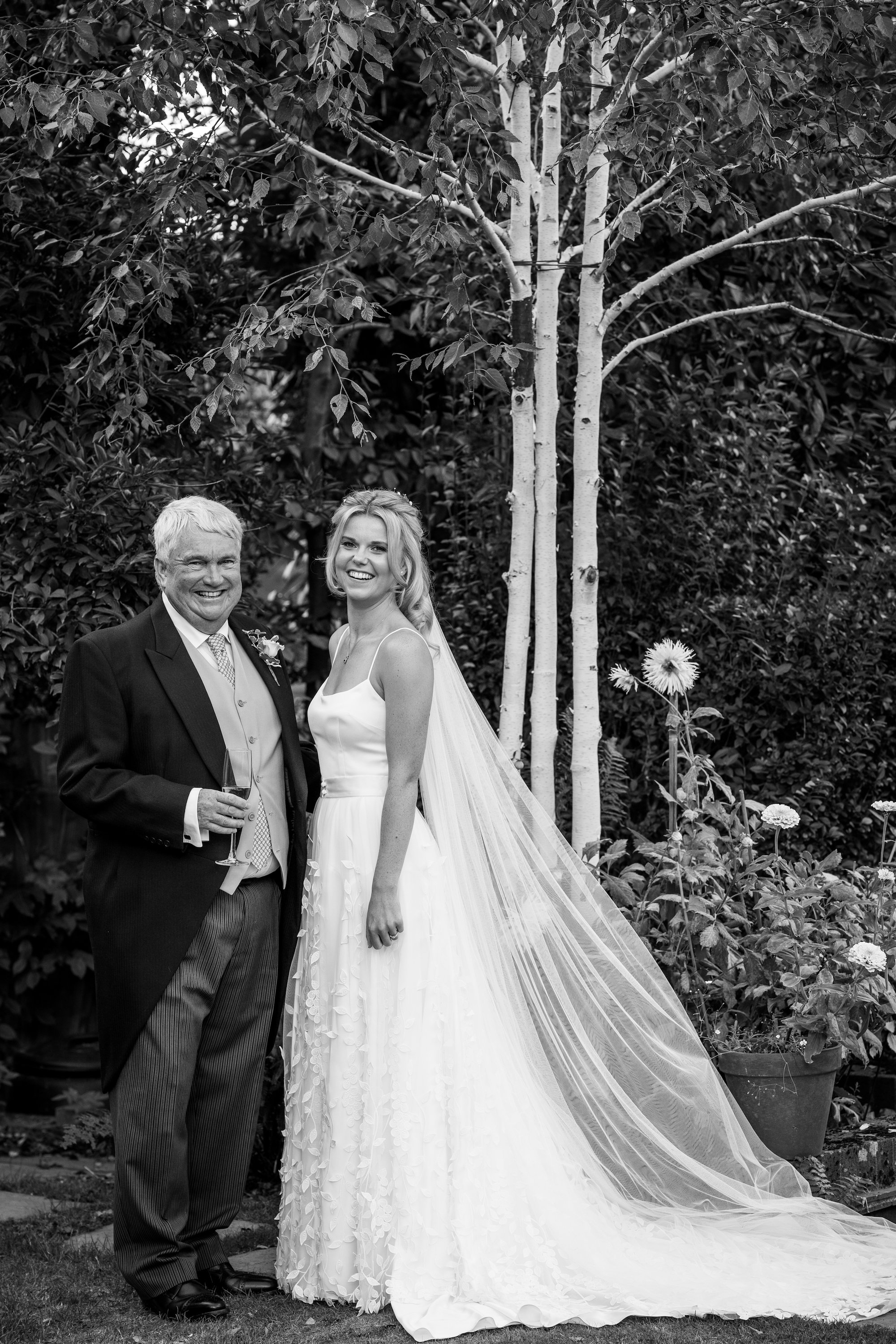 Beautiful bride Emily wore the Finsbury wedding dress and Beale overskirt by Halfpenny London on her wedding day