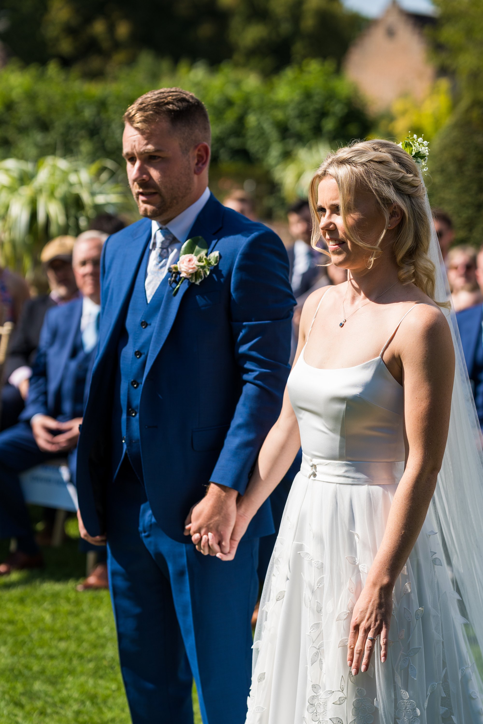 Beautiful bride Emily wore the Finsbury wedding dress and Beale overskirt by Halfpenny London on her wedding day