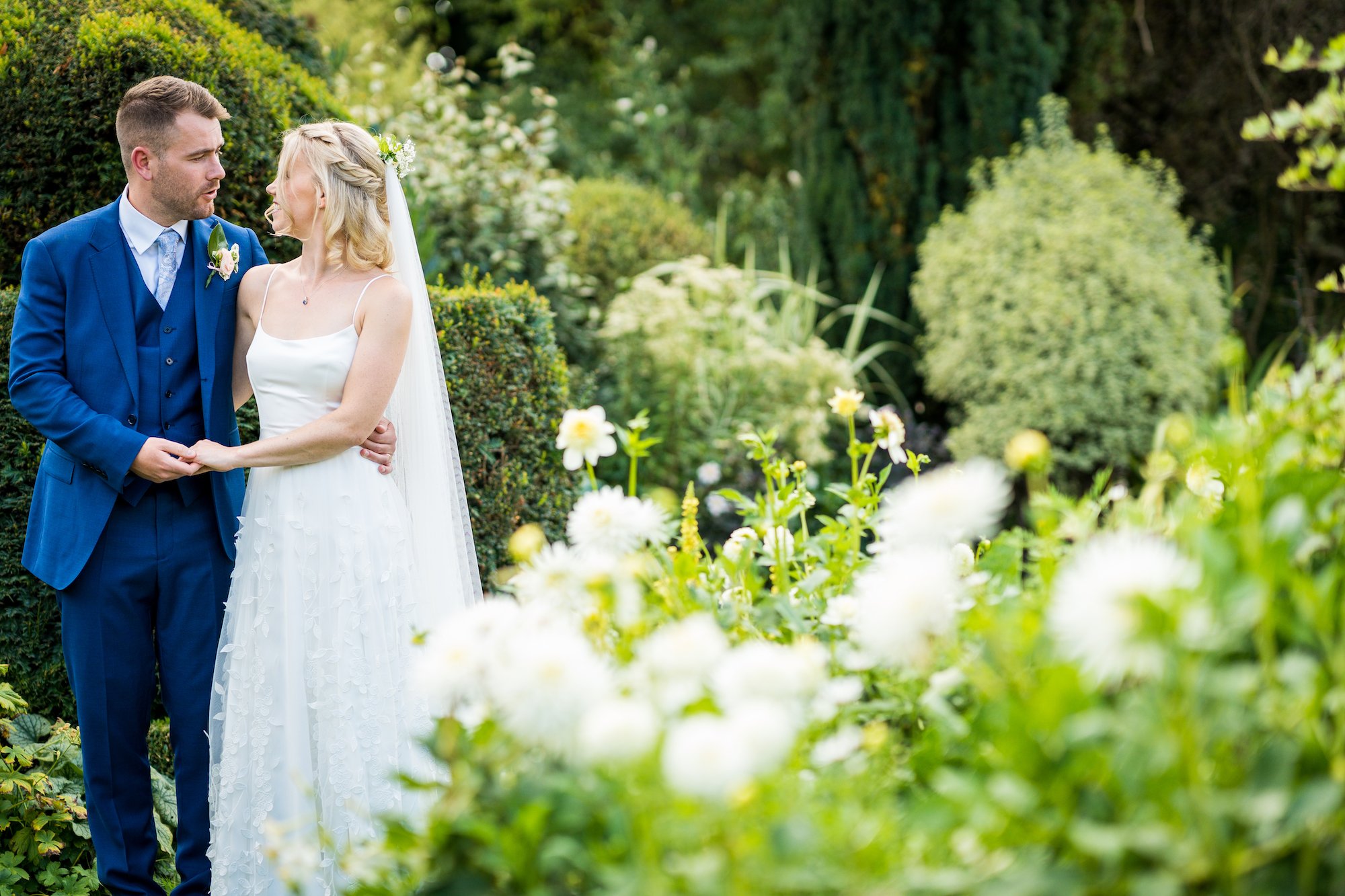 Beautiful bride Emily wore the Finsbury wedding dress and Beale overskirt by Halfpenny London on her wedding day
