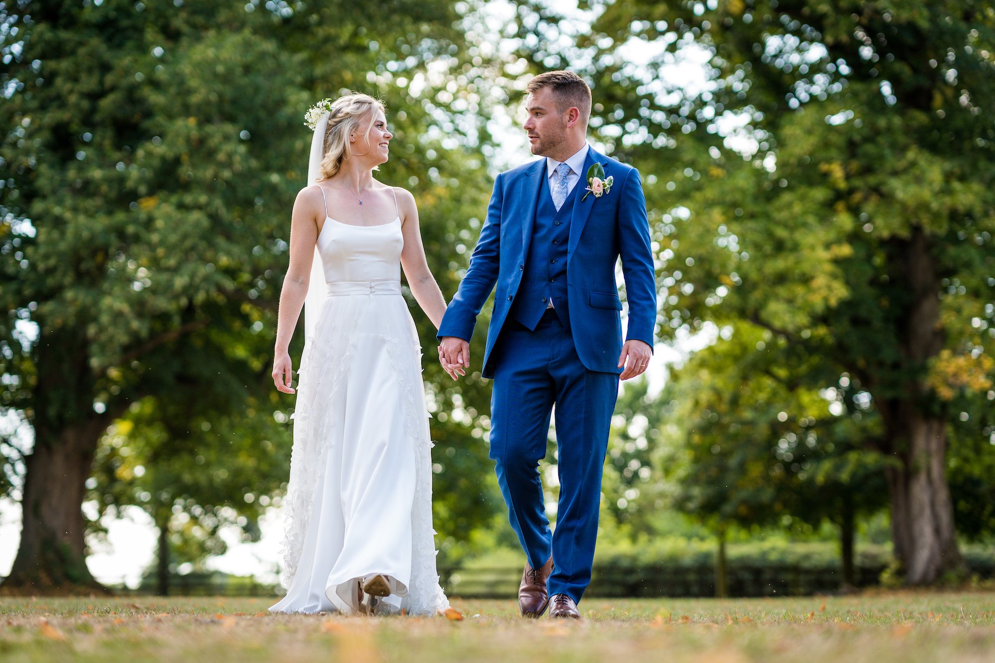 Beautiful bride Emily wore the Finsbury wedding dress and Beale overskirt by Halfpenny London on her wedding day