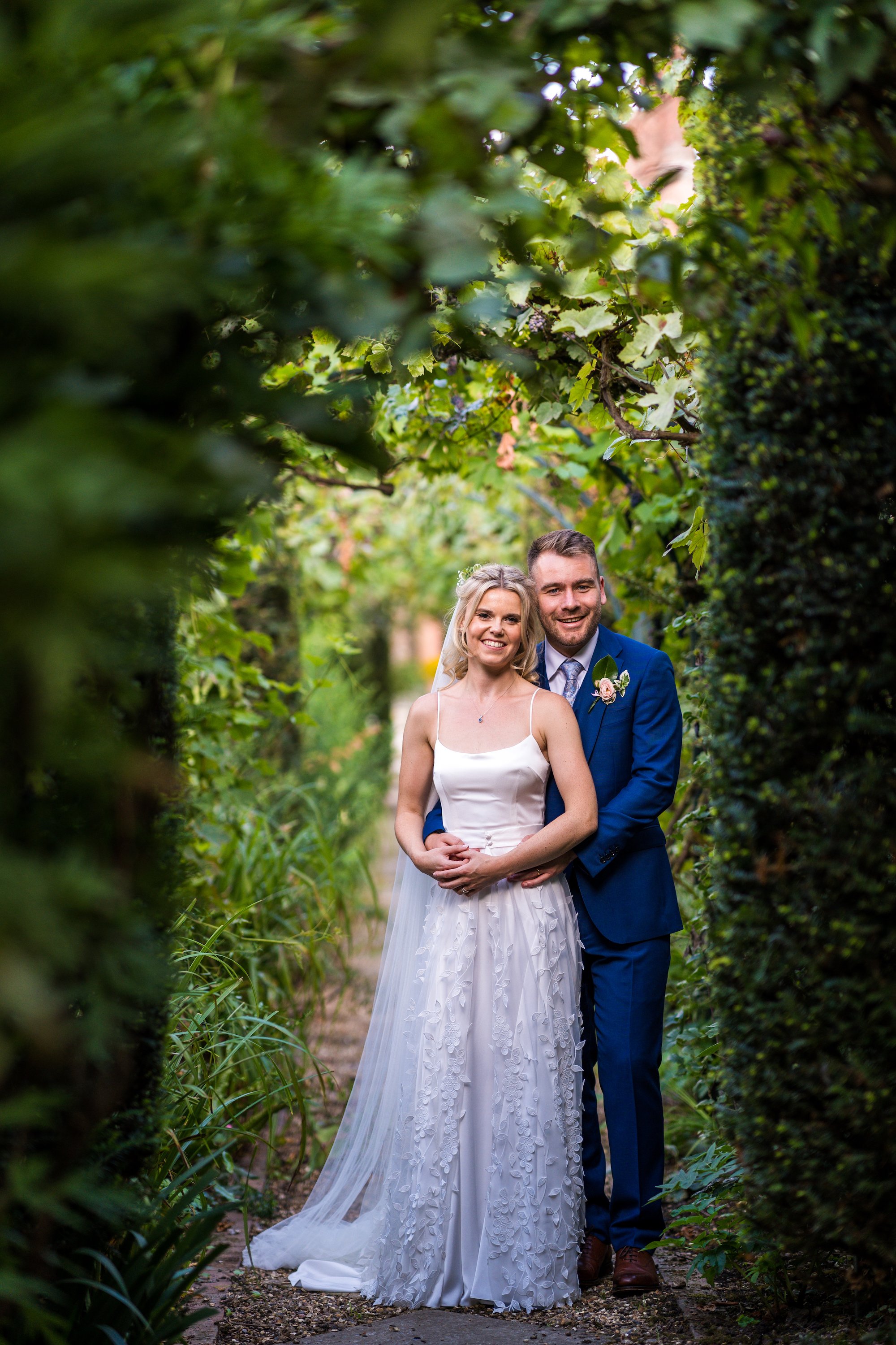 Beautiful bride Emily wore the Finsbury wedding dress and Beale overskirt by Halfpenny London on her wedding day