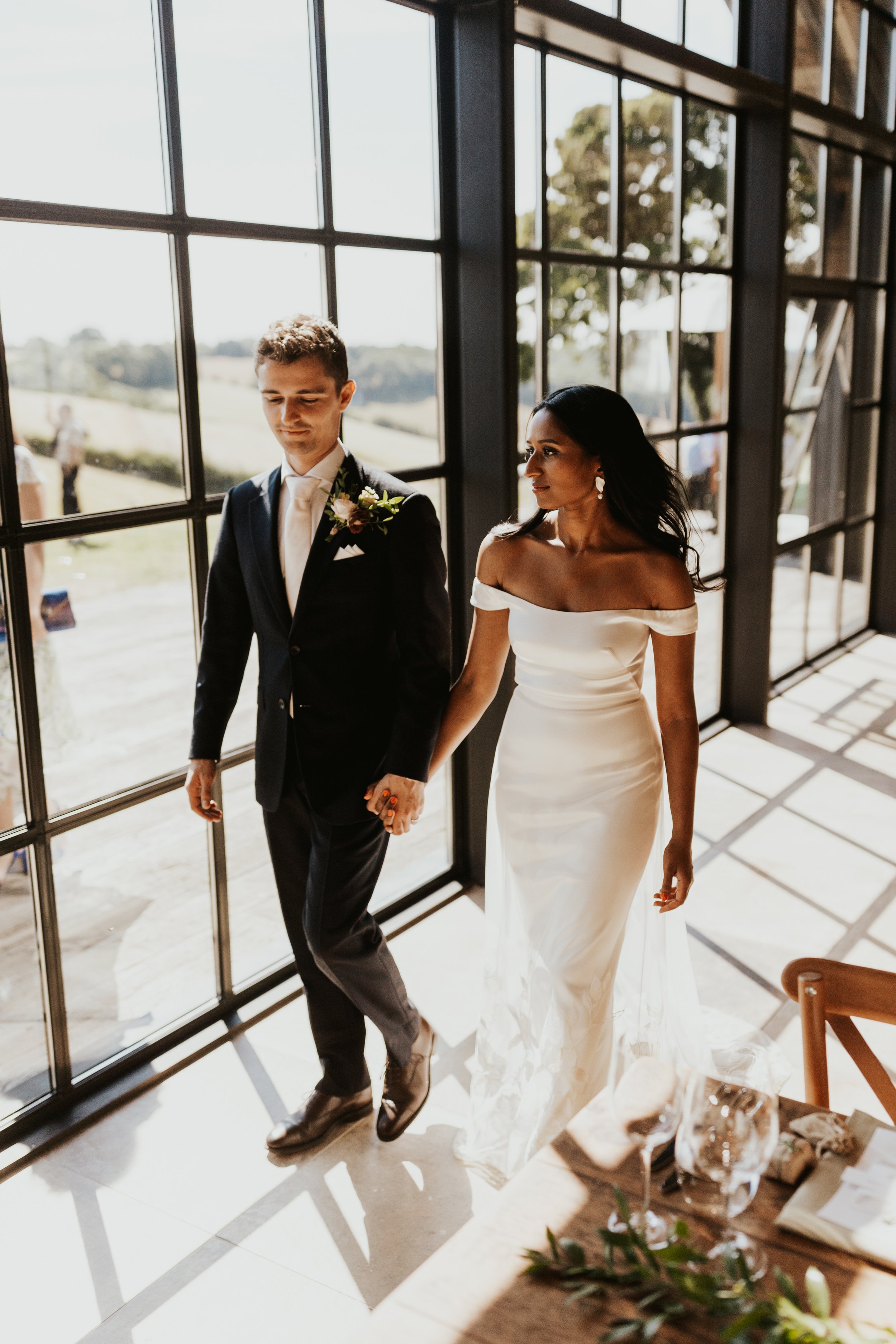 Beautiful bride Anjana wore the Harbour wedding dress and Lily overskirt by Halfpenny London 