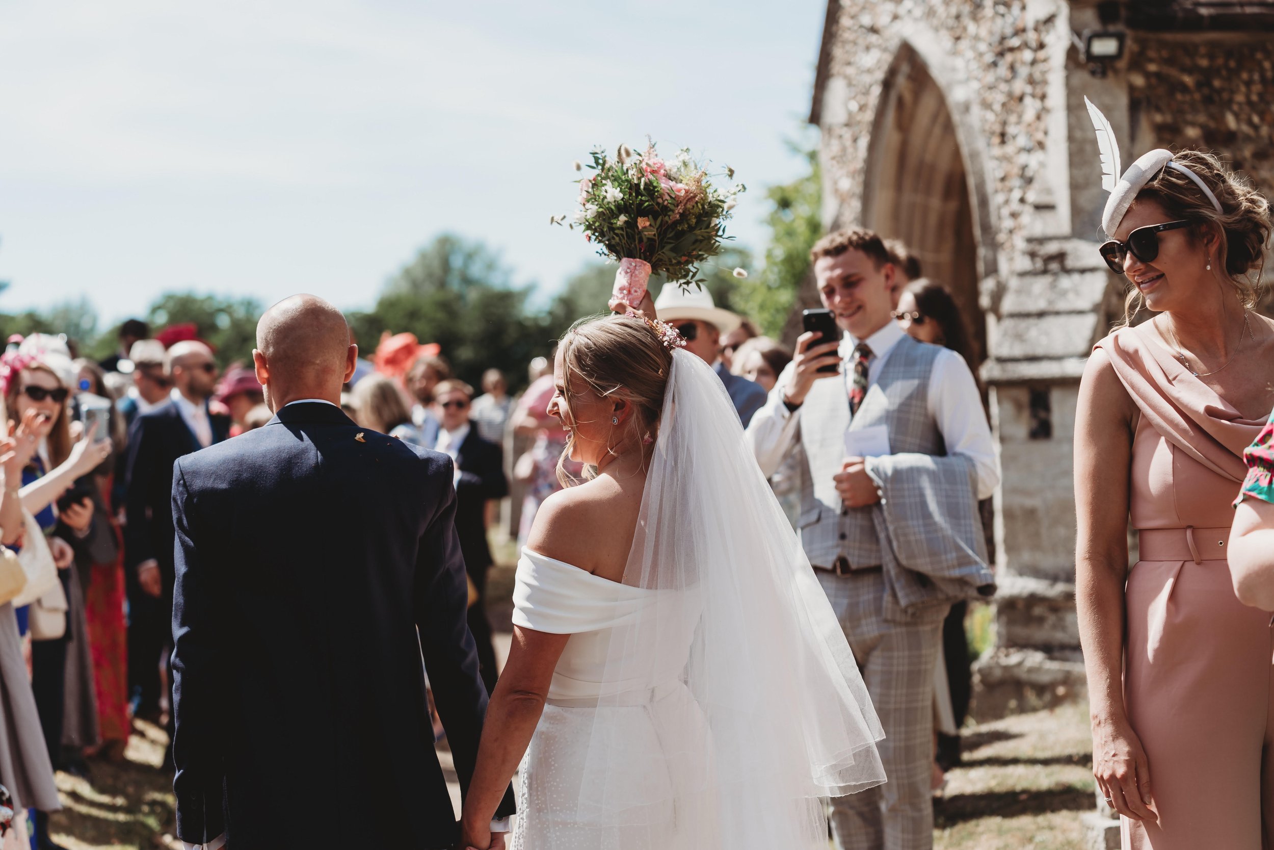 Beautiful bride Alice wears the Daffodil dress and Scotty skirt by Halfpenny London