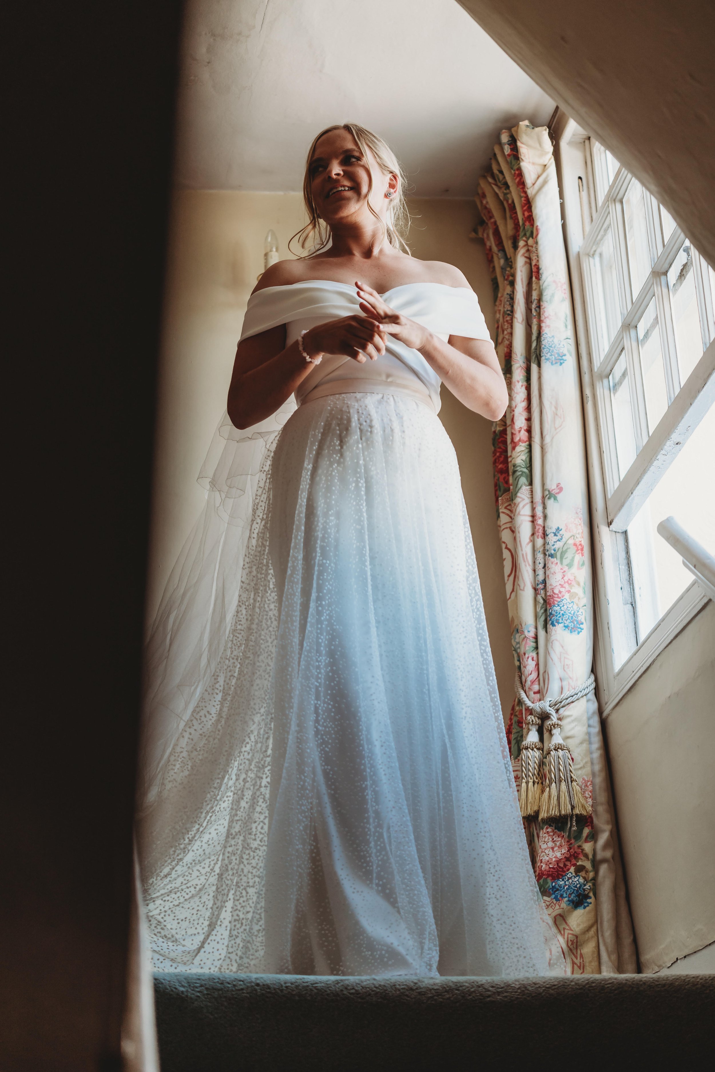 Beautiful bride Alice wears the Daffodil dress and Scotty skirt by Halfpenny London