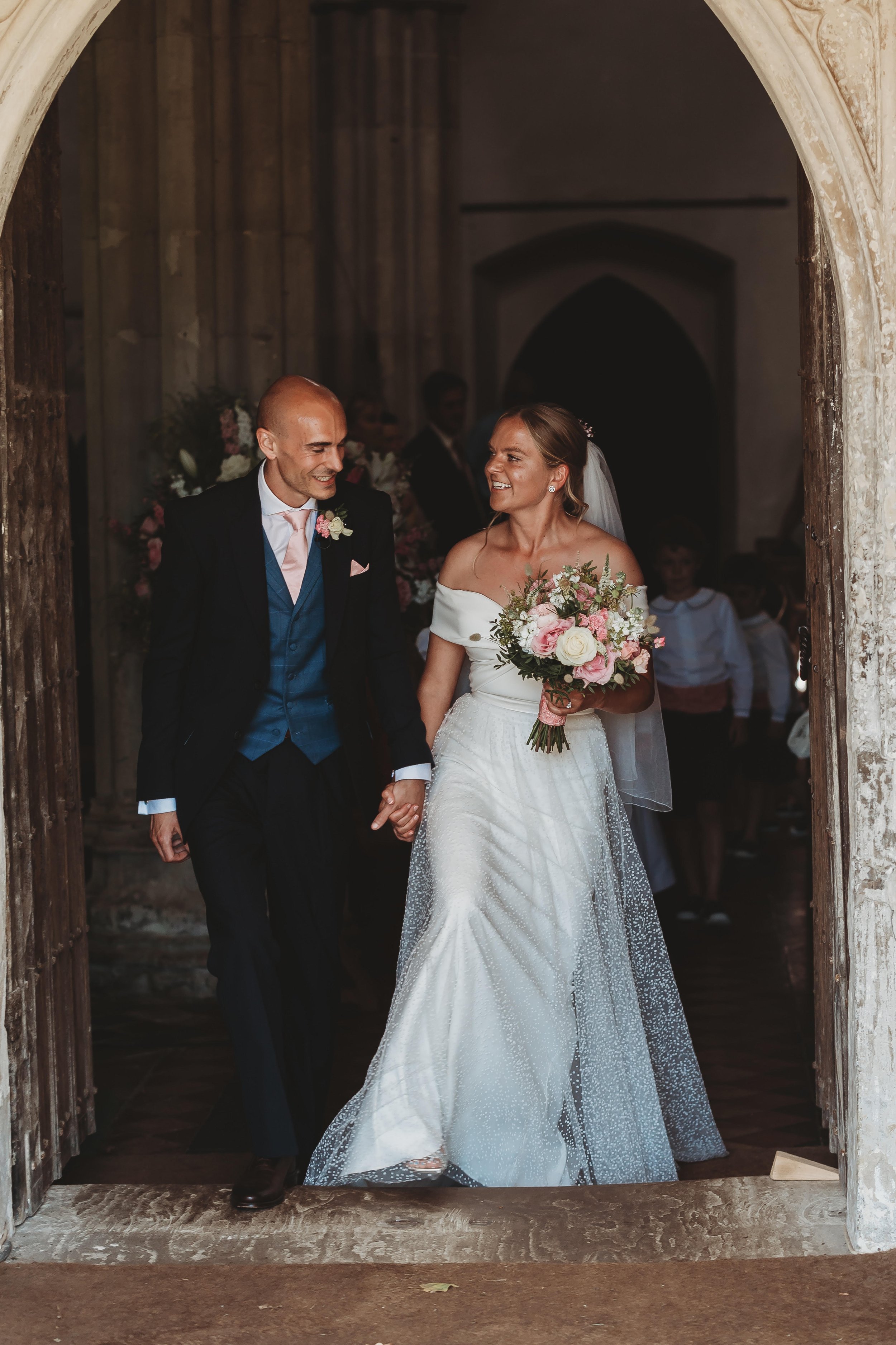 Beautiful bride Alice wears the Daffodil dress and Scotty skirt by Halfpenny London