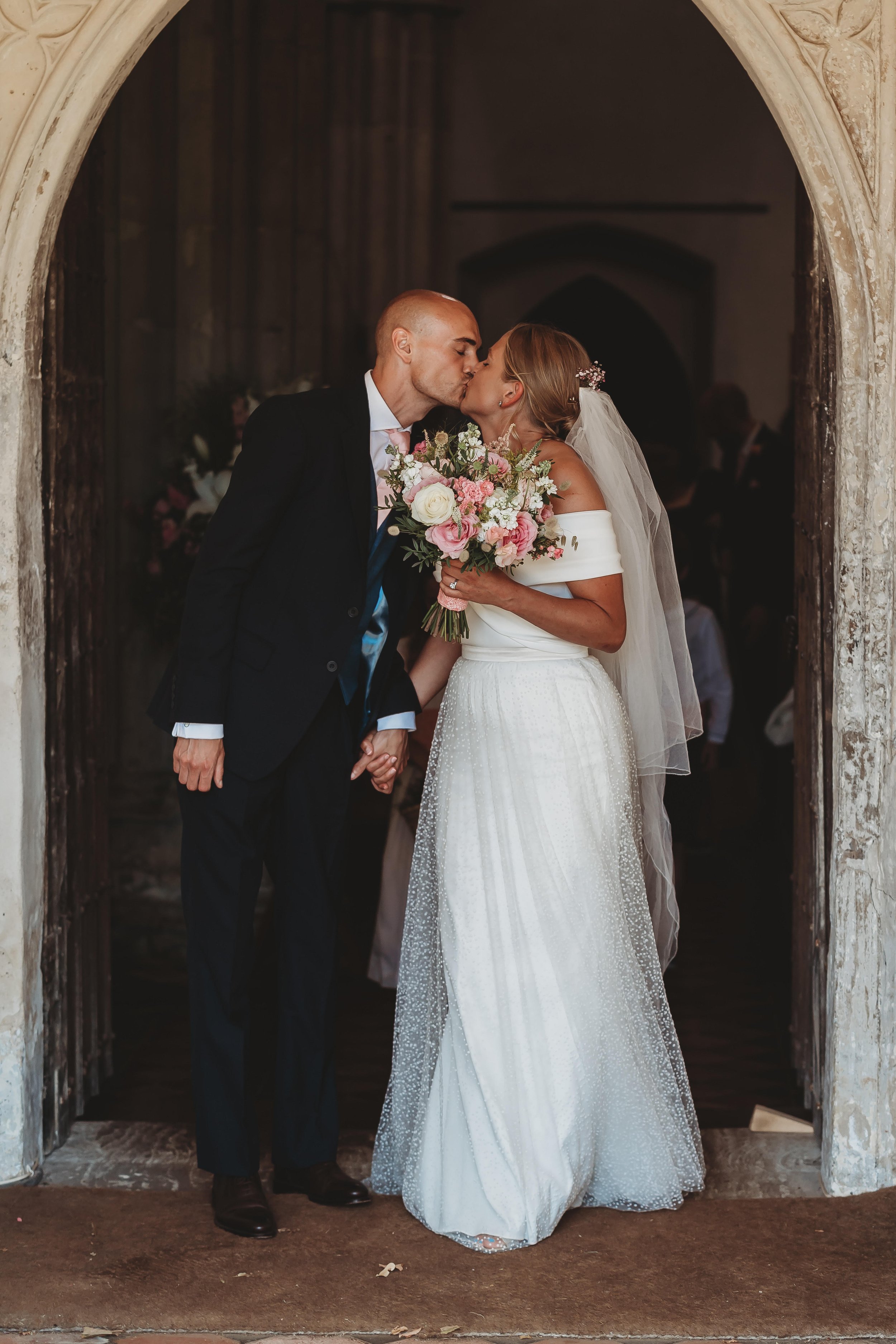 Beautiful bride Alice wears the Daffodil dress and Scotty skirt by Halfpenny London