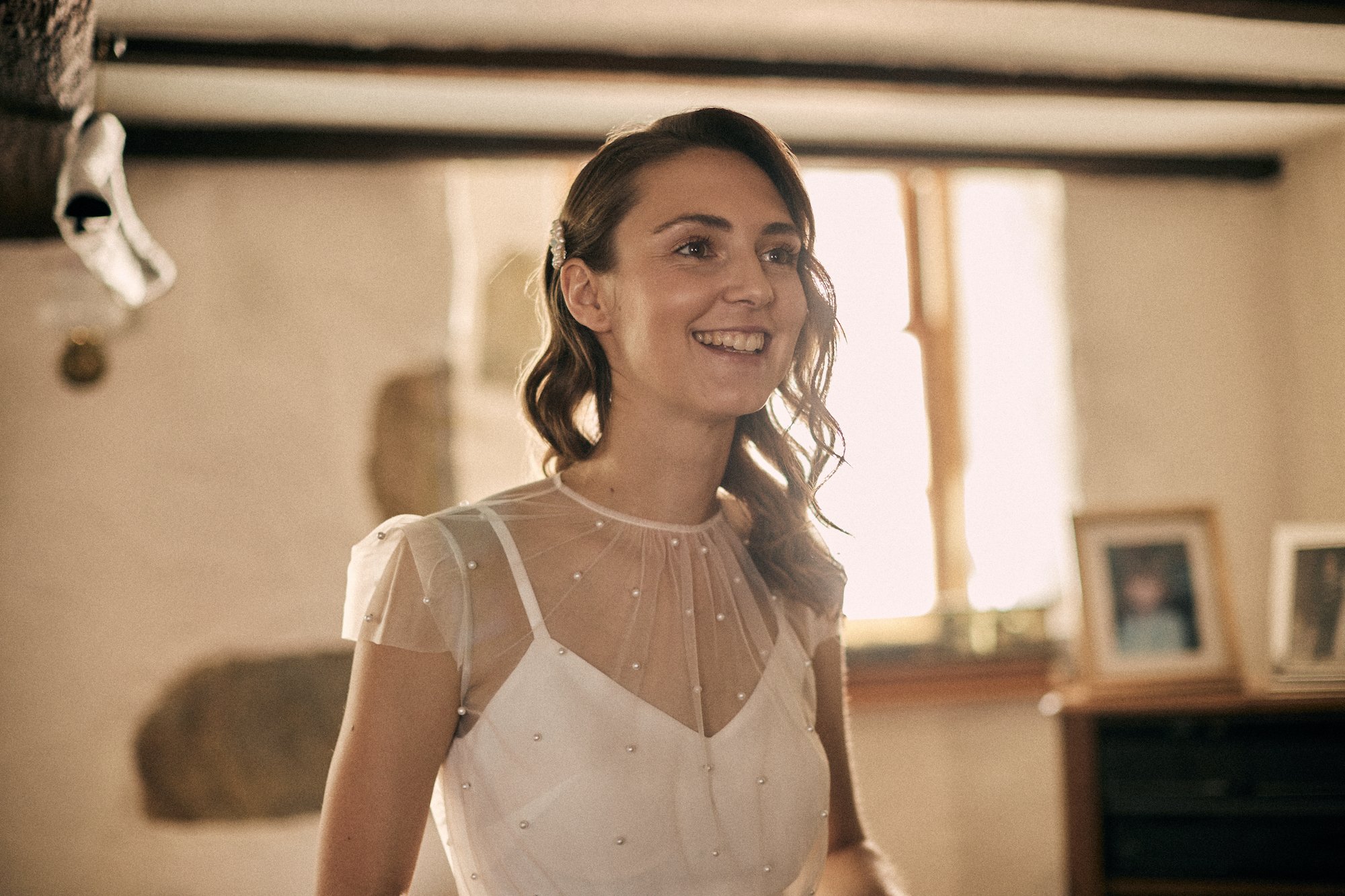 Beautiful bride  Emma wears the pearl dress with the victor slip | Wedding dresses by Halfpenny London