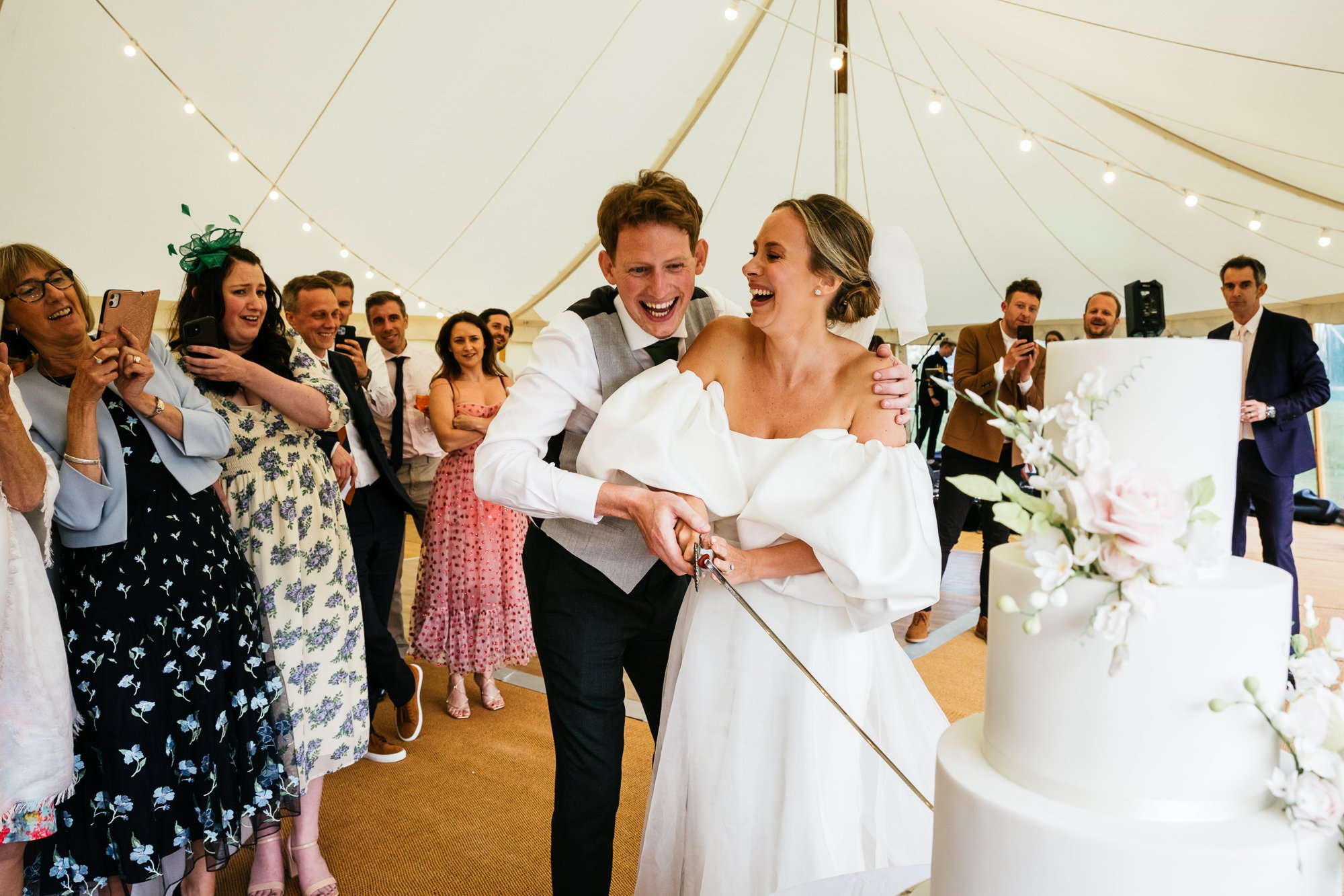 Beautiful bride Lucy wears the Oliver dress and Moon skirt paired with the Sun sleeves | Wedding dresses by Halfpenny London