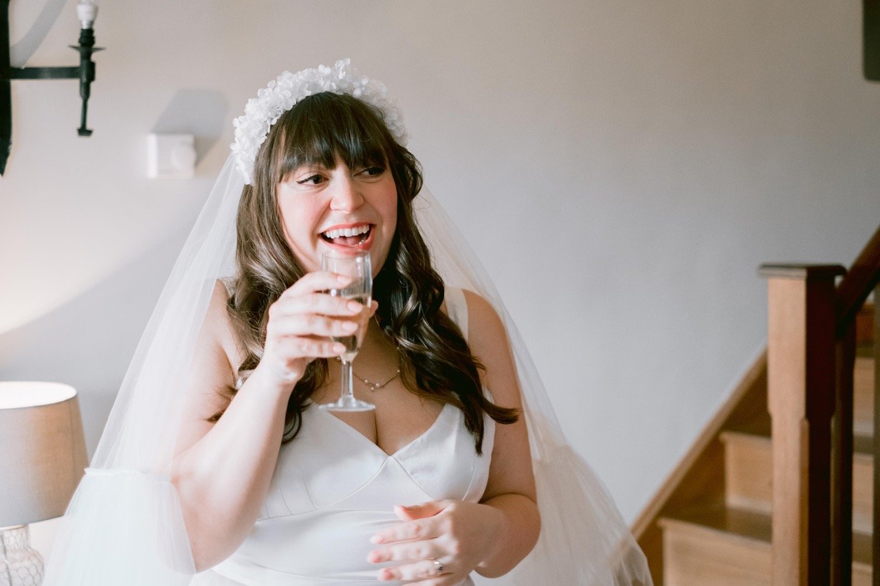 Beautiful bride Anna wears the Ivory Ash dress and Mayfair skirt | Wedding dresses by Halfpenny London