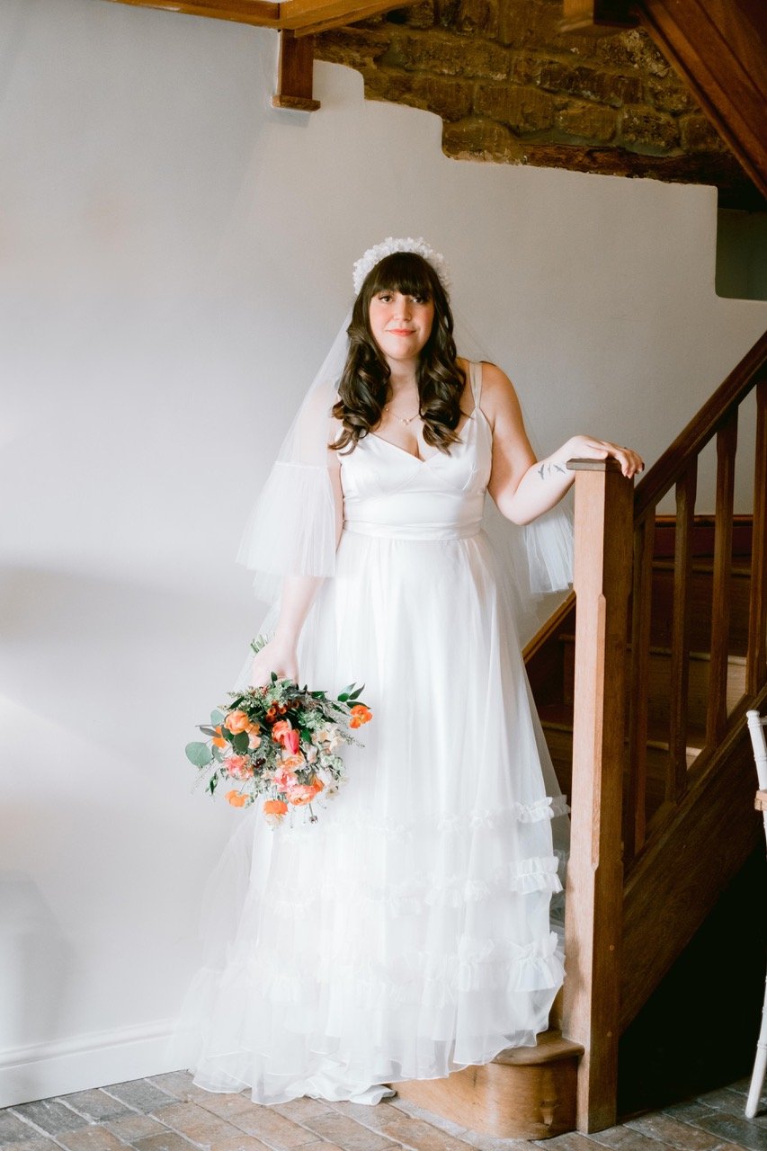 Beautiful bride Anna wears the Ivory Ash dress and Mayfair skirt | Wedding dresses by Halfpenny London