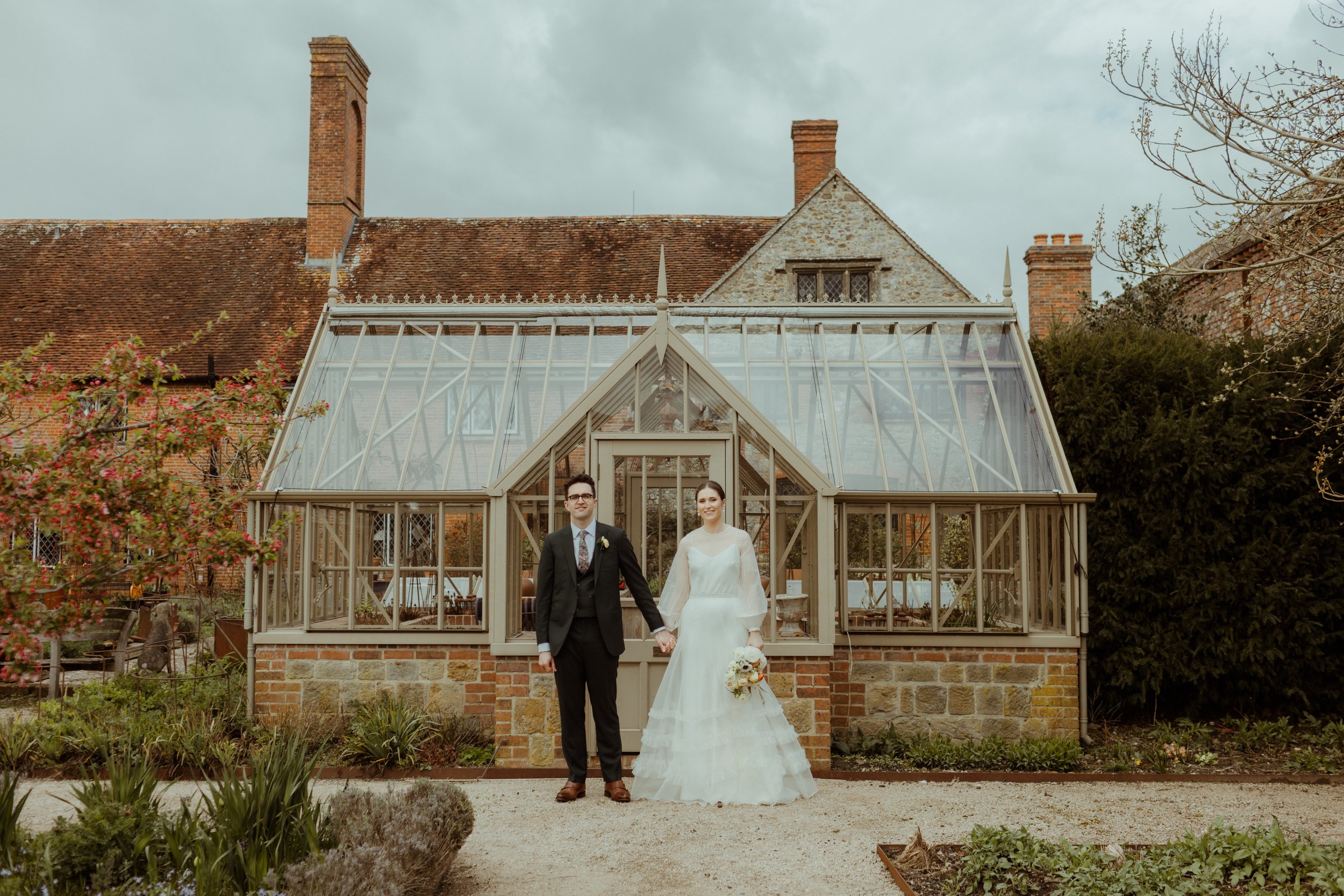 Beautiful bride Georgie wears the Iris slip, Mayfair skirt and the Daniel top | Wedding dresses by Halfpenny London