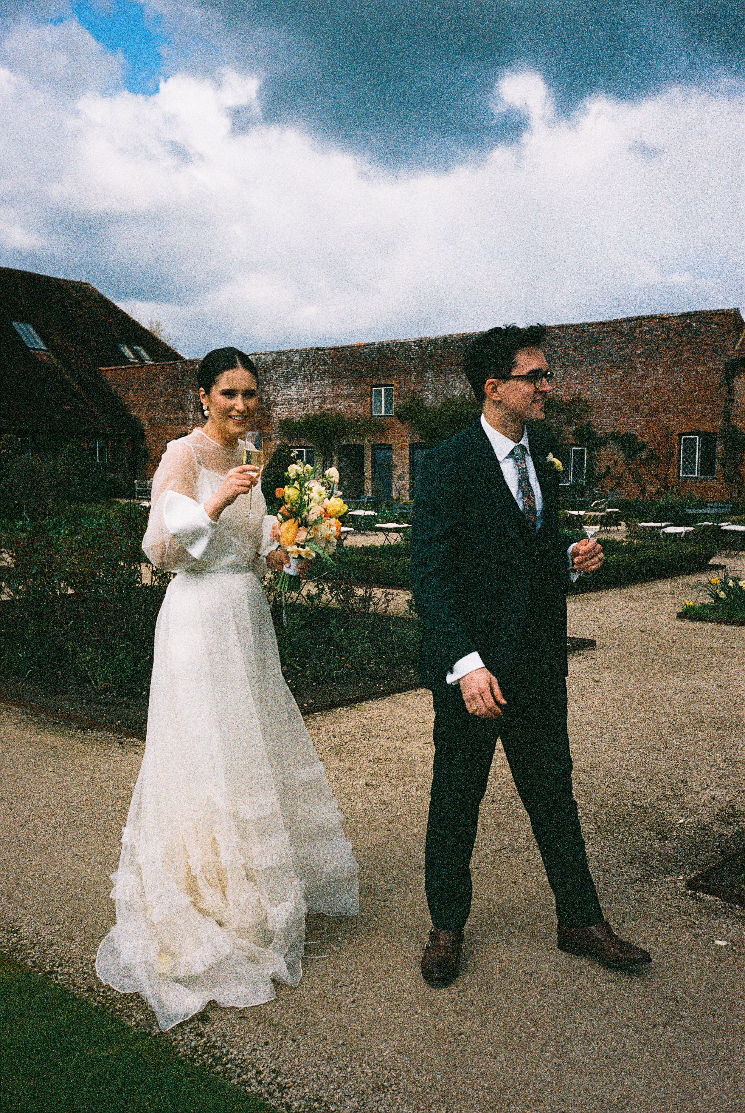 Beautiful bride Georgie wears the Iris slip, Mayfair skirt and the Daniel top | Wedding dresses by Halfpenny London