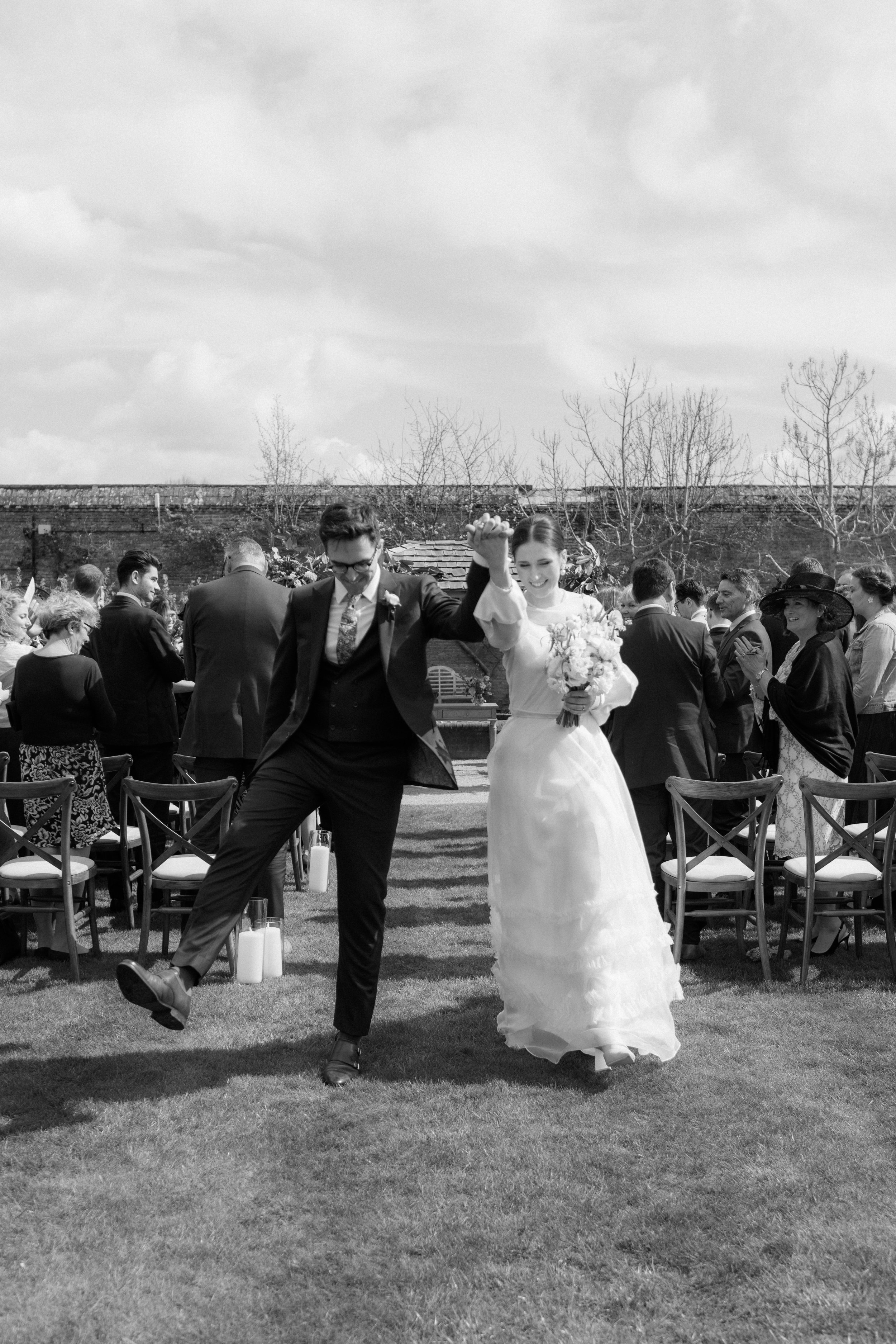 Beautiful bride Georgie wears the Iris slip, Mayfair skirt and the Daniel top | Wedding dresses by Halfpenny London