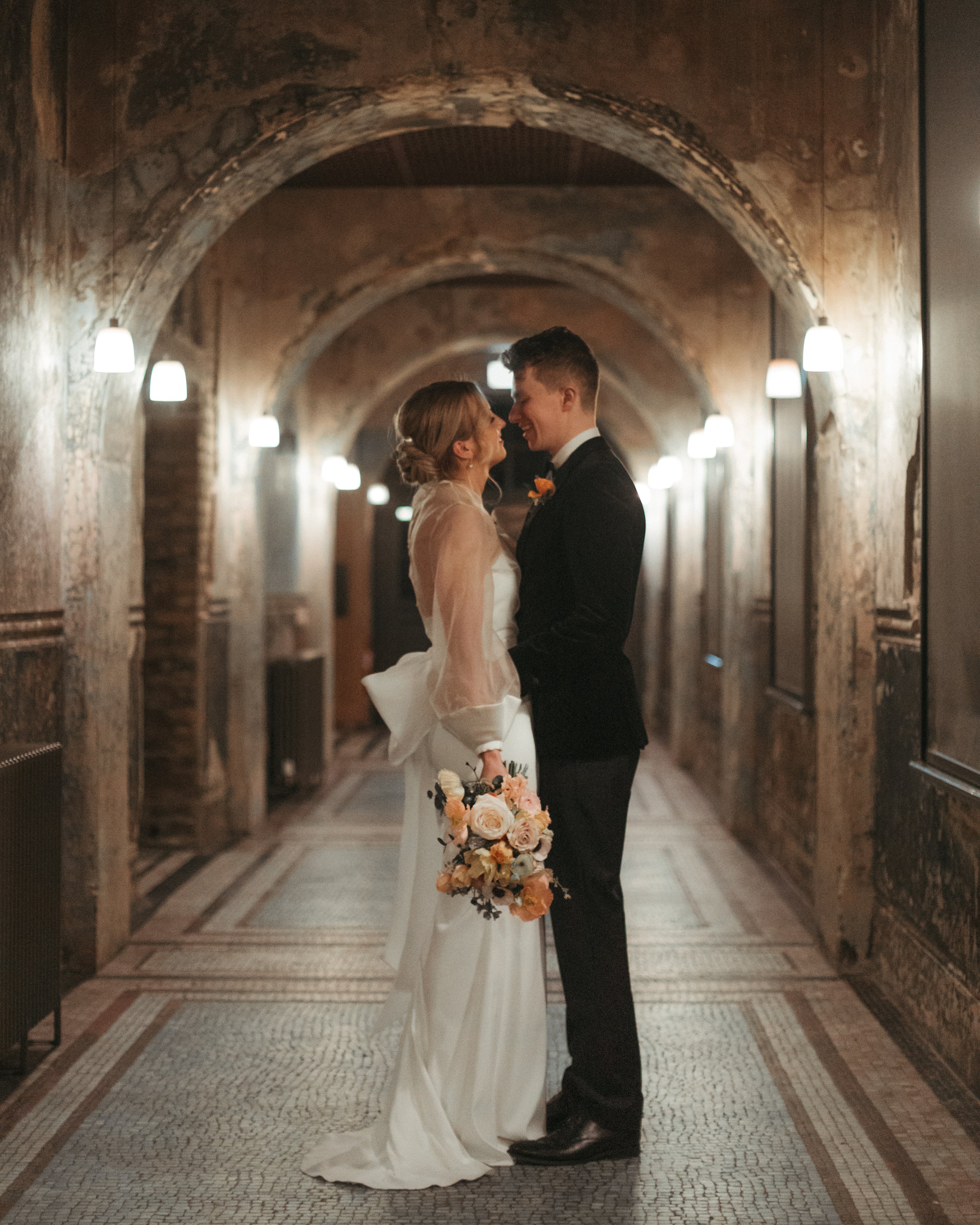 Beautiful bride Anna wears the Oliver dress with the Daniel top and Alpha bow | Wedding dresses by Halfpenny London