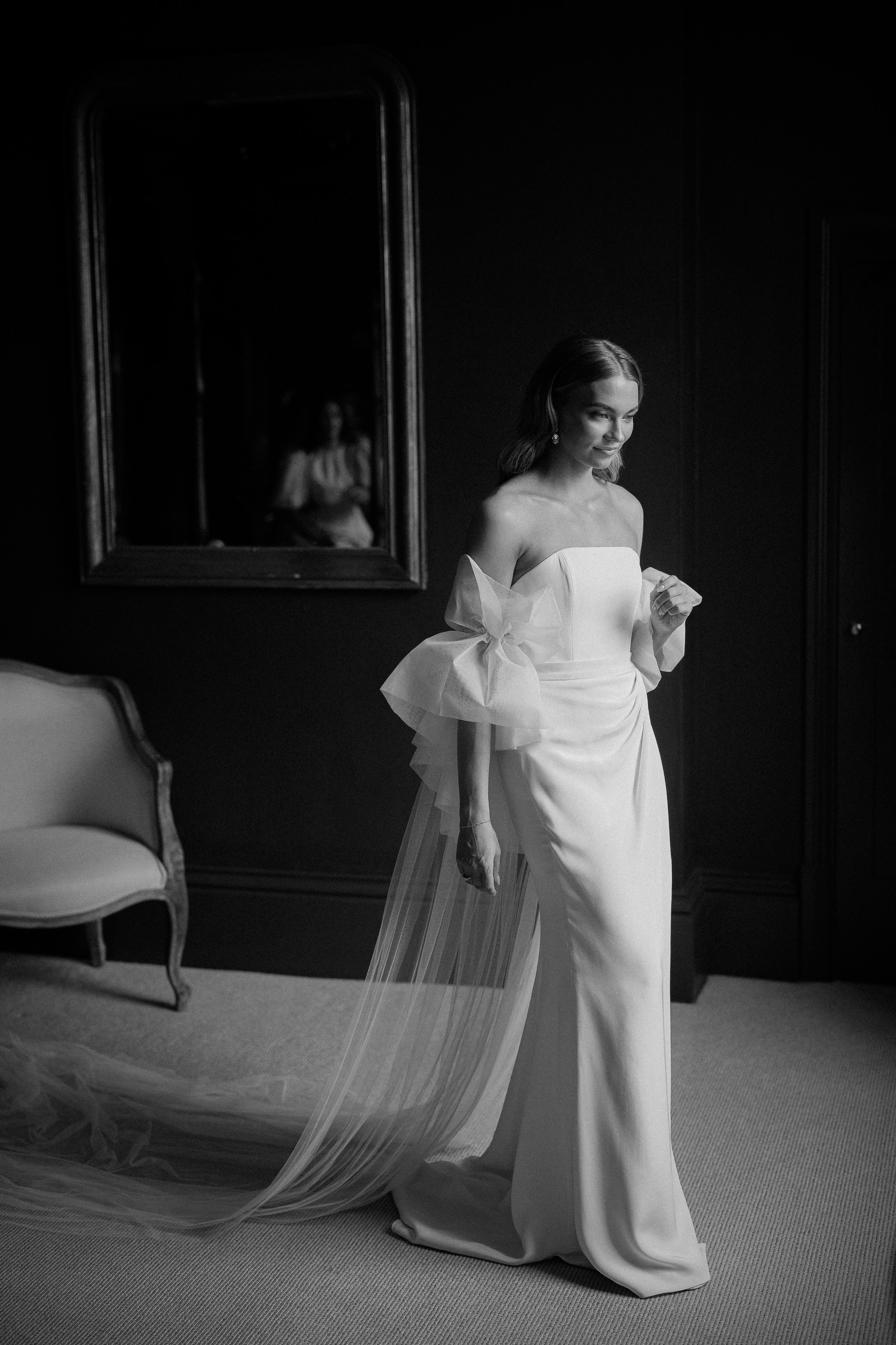 Beautiful bride Mia wears the Oliver corset and Okotan long skirt paired with the Issa shrug and detachable train | Wedding dresses by Halfpenny London